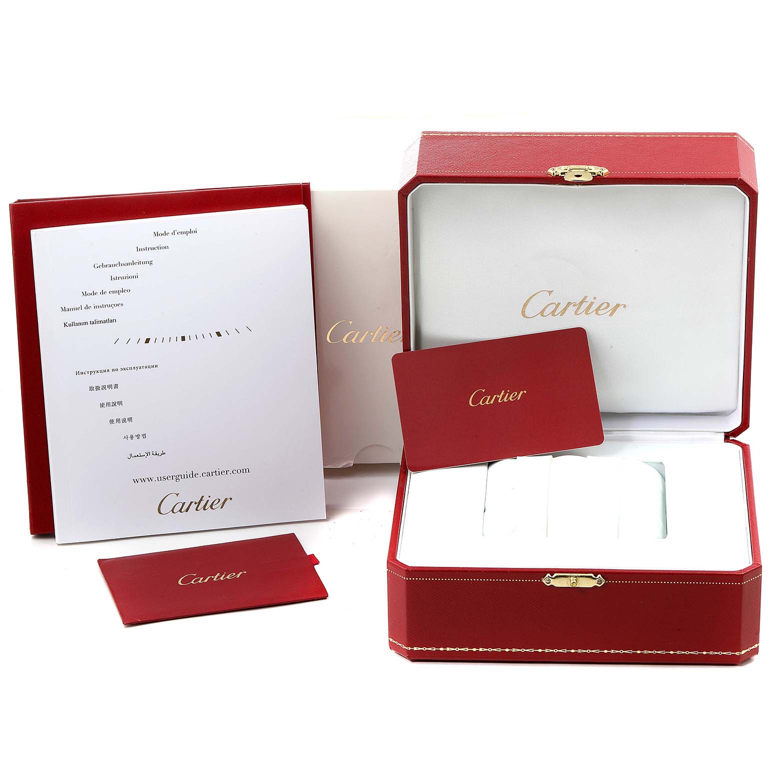 The image shows the accessories for the Calibre de Cartier watch, including a red presentation box, booklet, and warranty card.