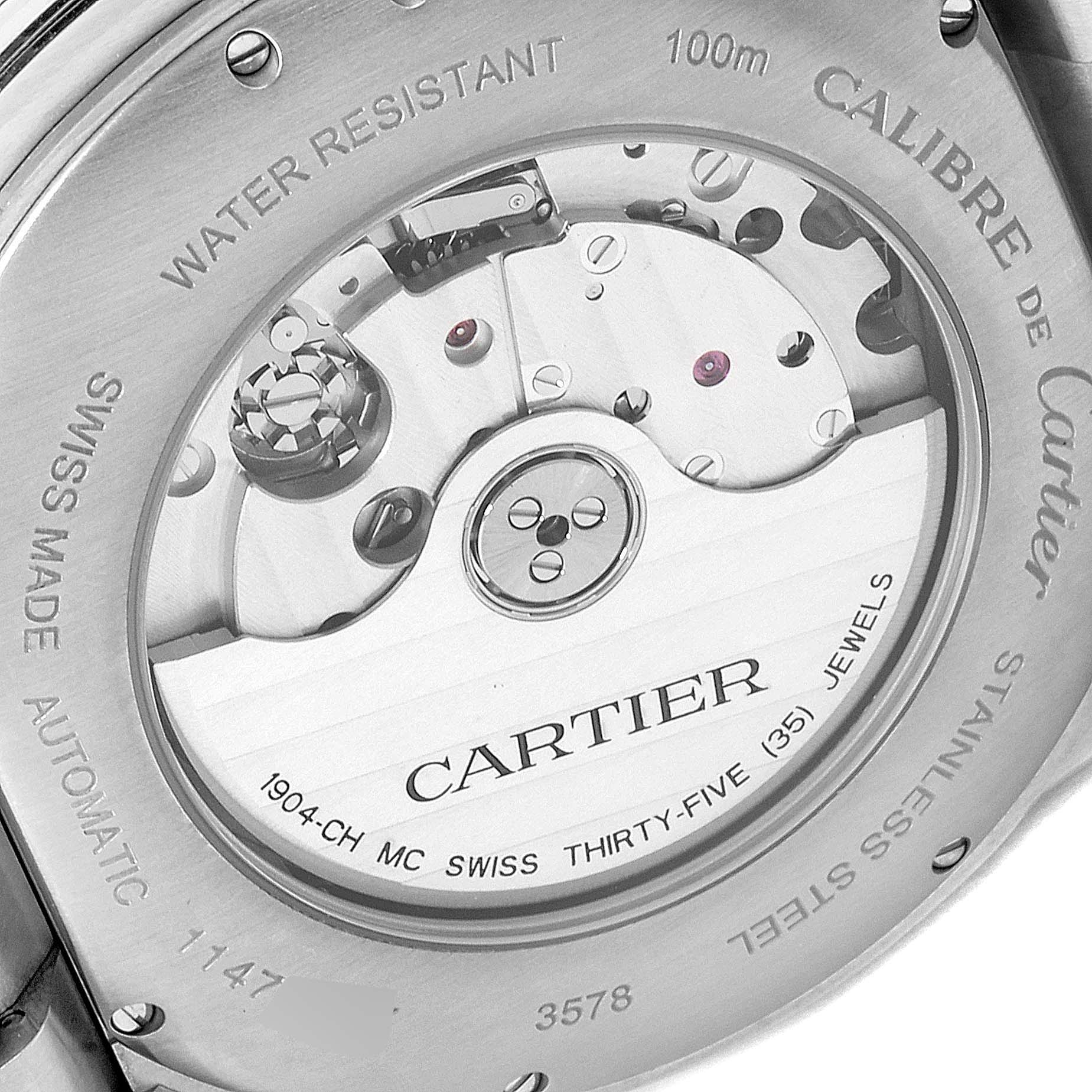 This is the back view of the Calibre de Cartier watch by Cartier, showing the movement and various engravings.