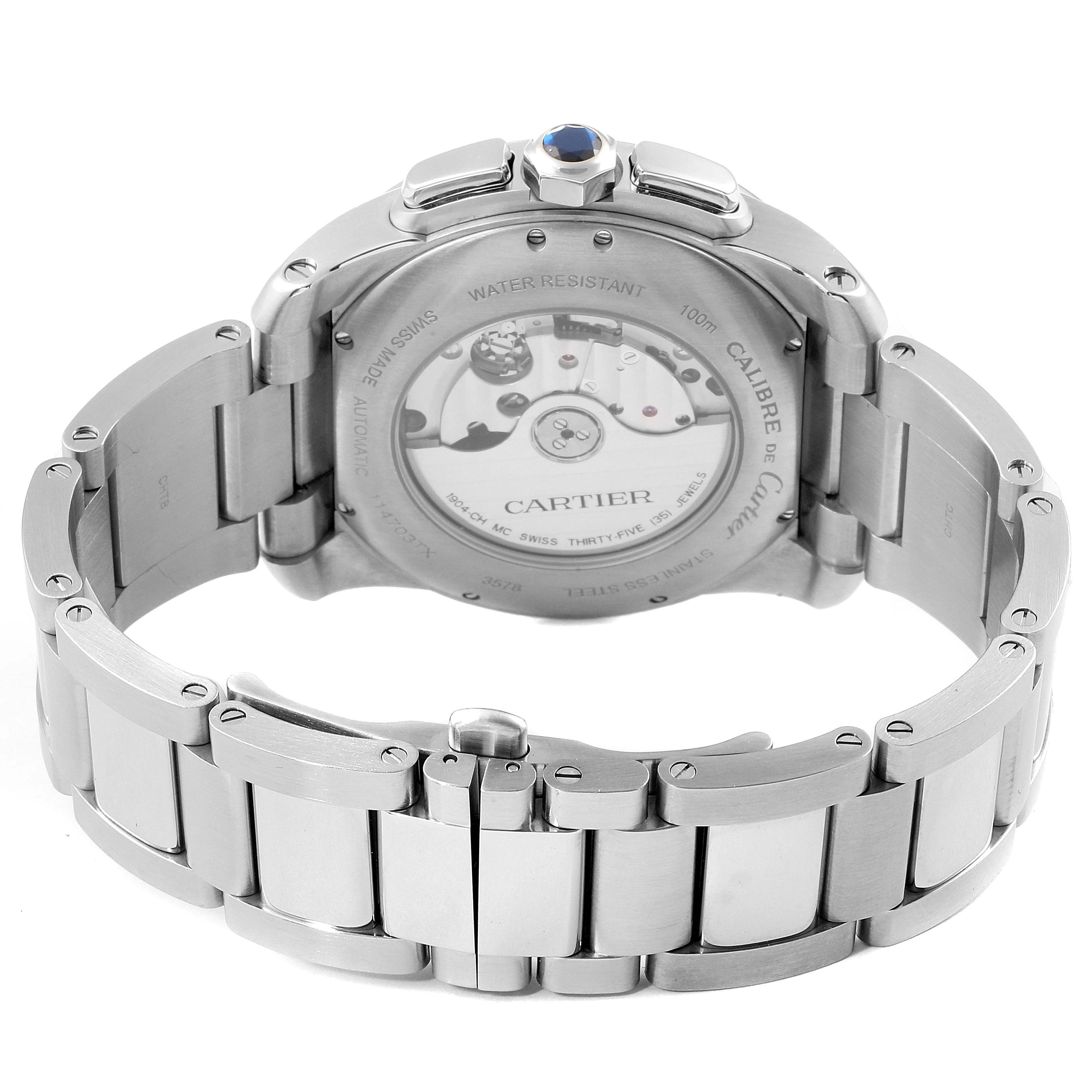 This image shows the reverse side of the Calibre de Cartier watch by Cartier, highlighting the back case and bracelet.