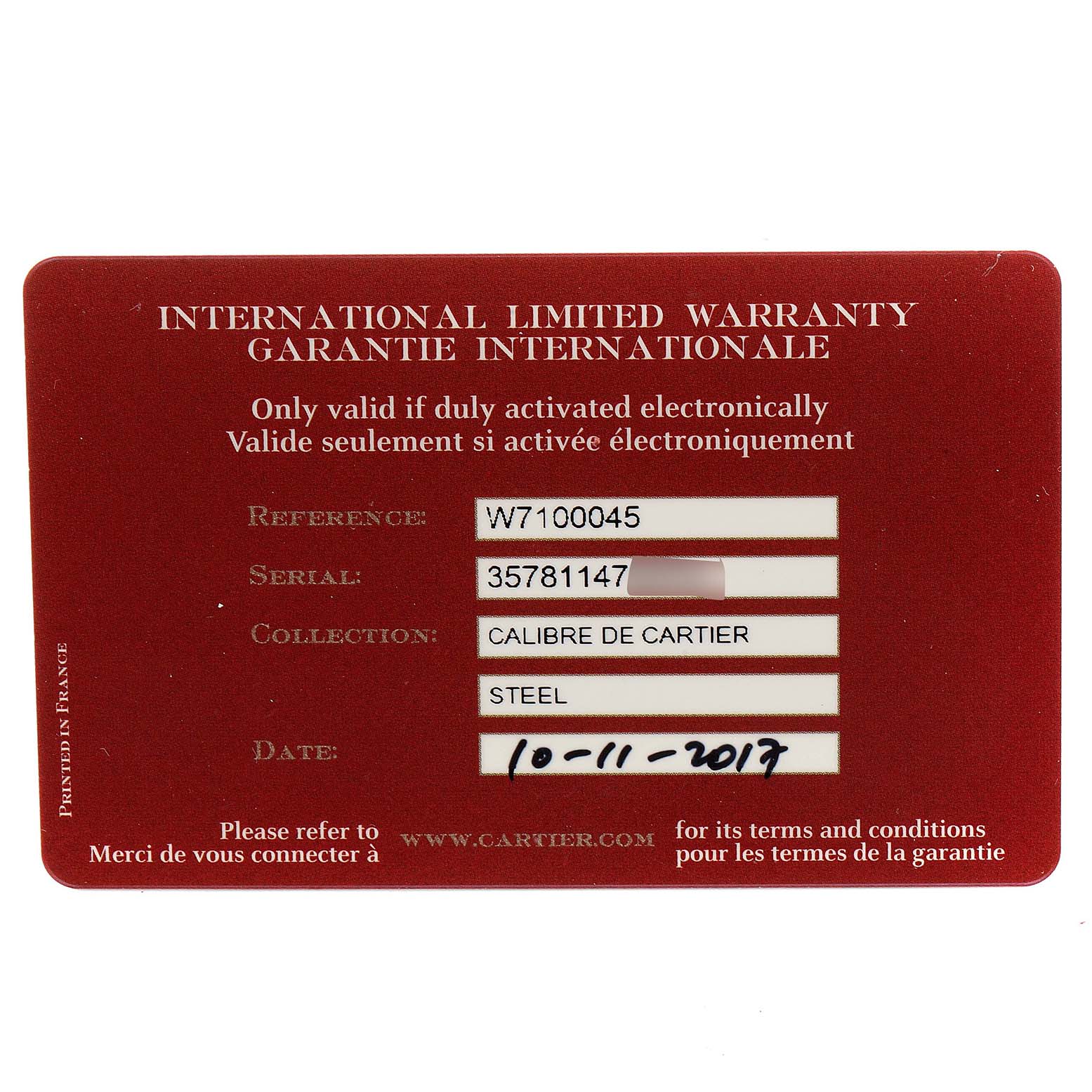 The image shows an International Limited Warranty card for the Calibre de Cartier model by Cartier, including reference, serial number, collection, material, and date.