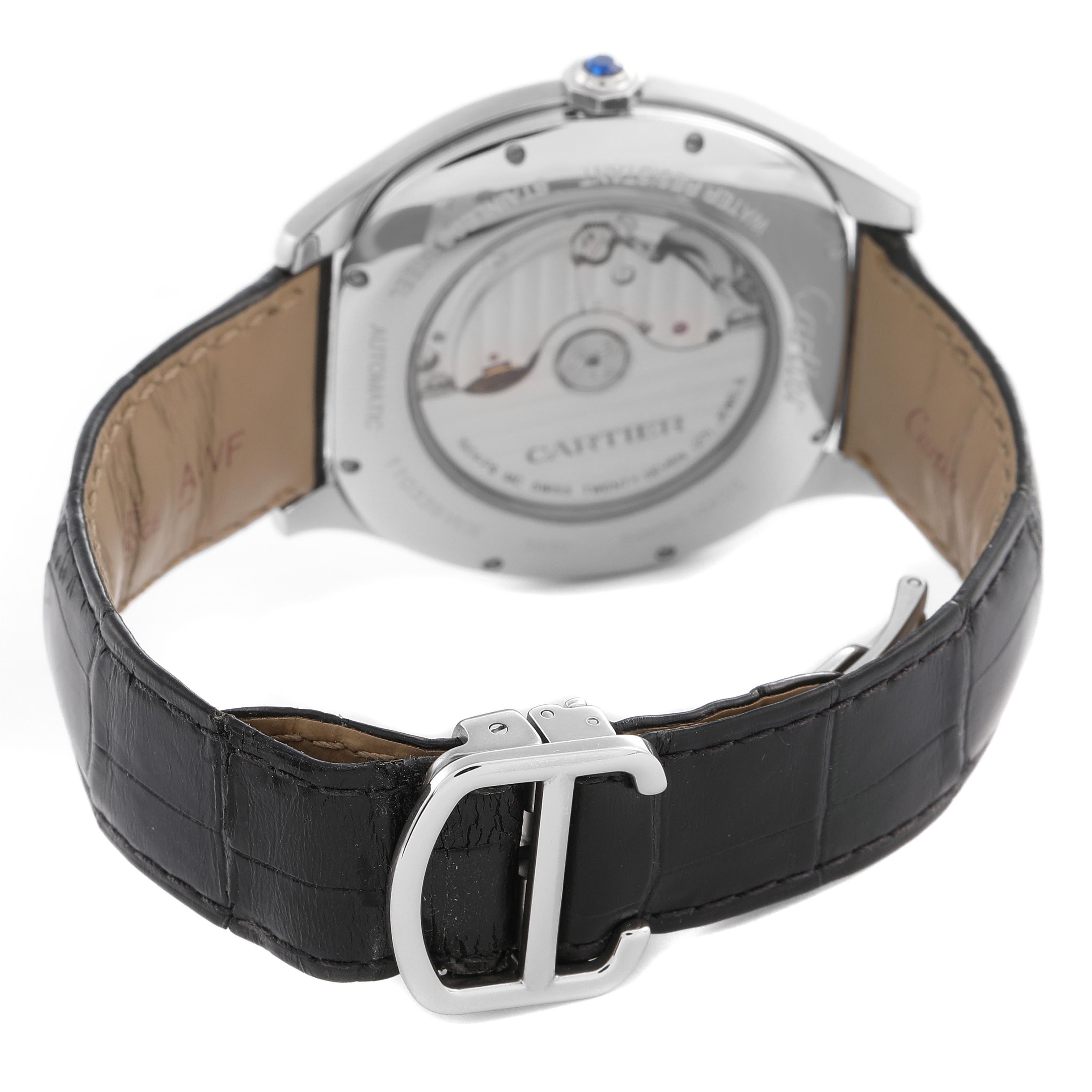 The Drive de Cartier watch is shown from the back, displaying its case back and black leather strap with a metal clasp.