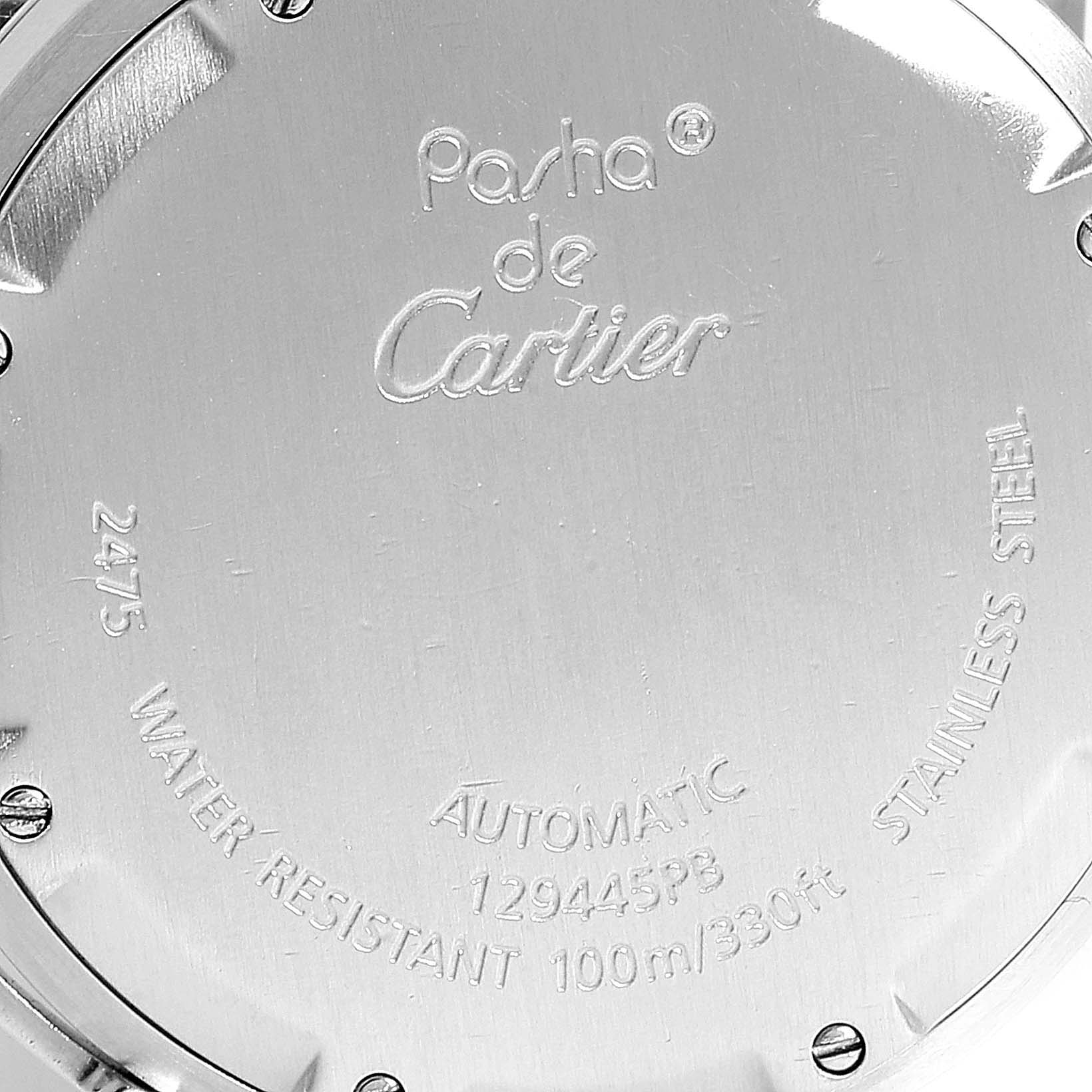 This image shows the back case of a Cartier Pasha W31058M7 Women
s Stainless Steel Pink Dial W31058M7 Women
s Stainless Steel Pink Dial watch, featuring model details and engravings.