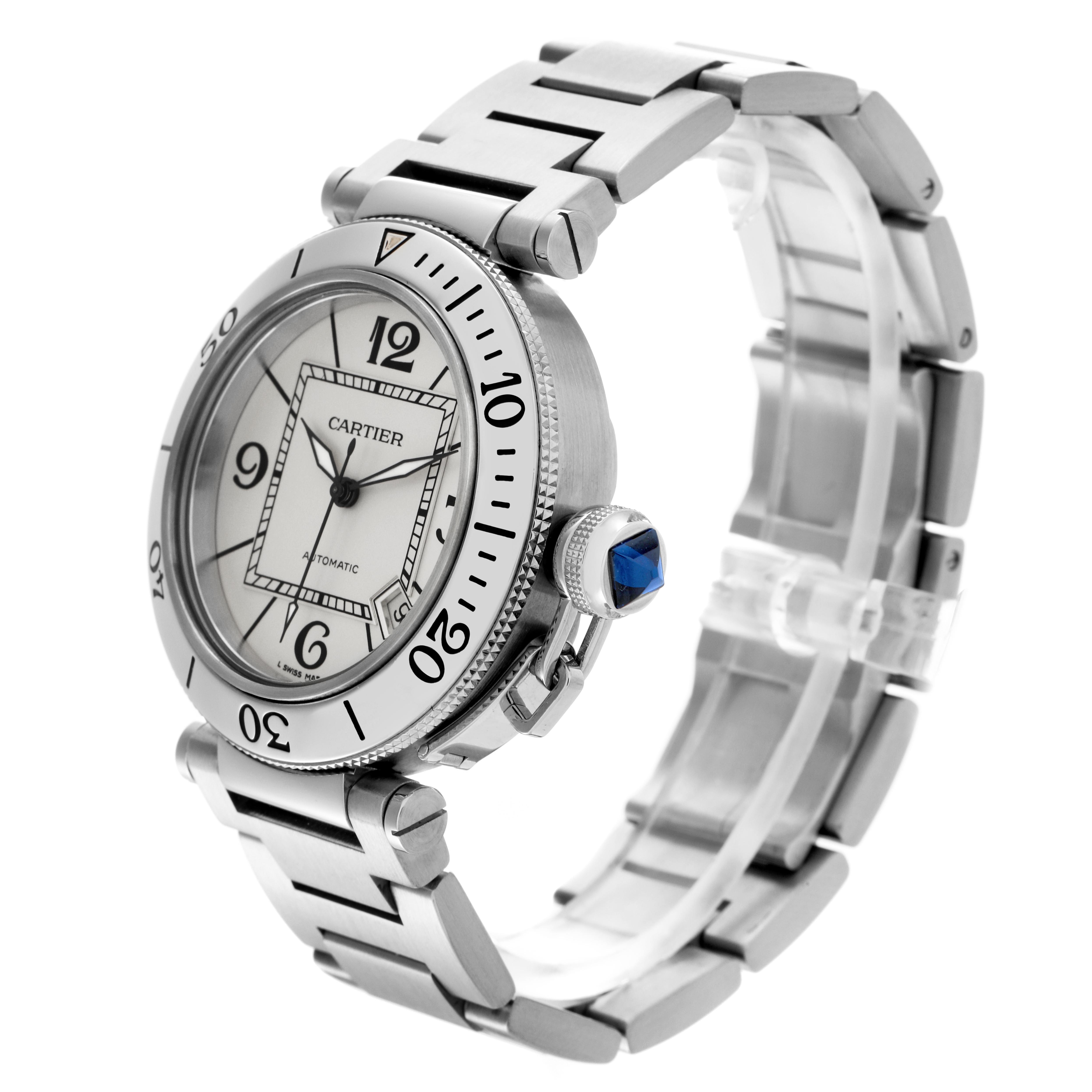 The Pasha de Cartier watch is shown from a front-left angle, highlighting the face, bezel, crown, and part of the bracelet.