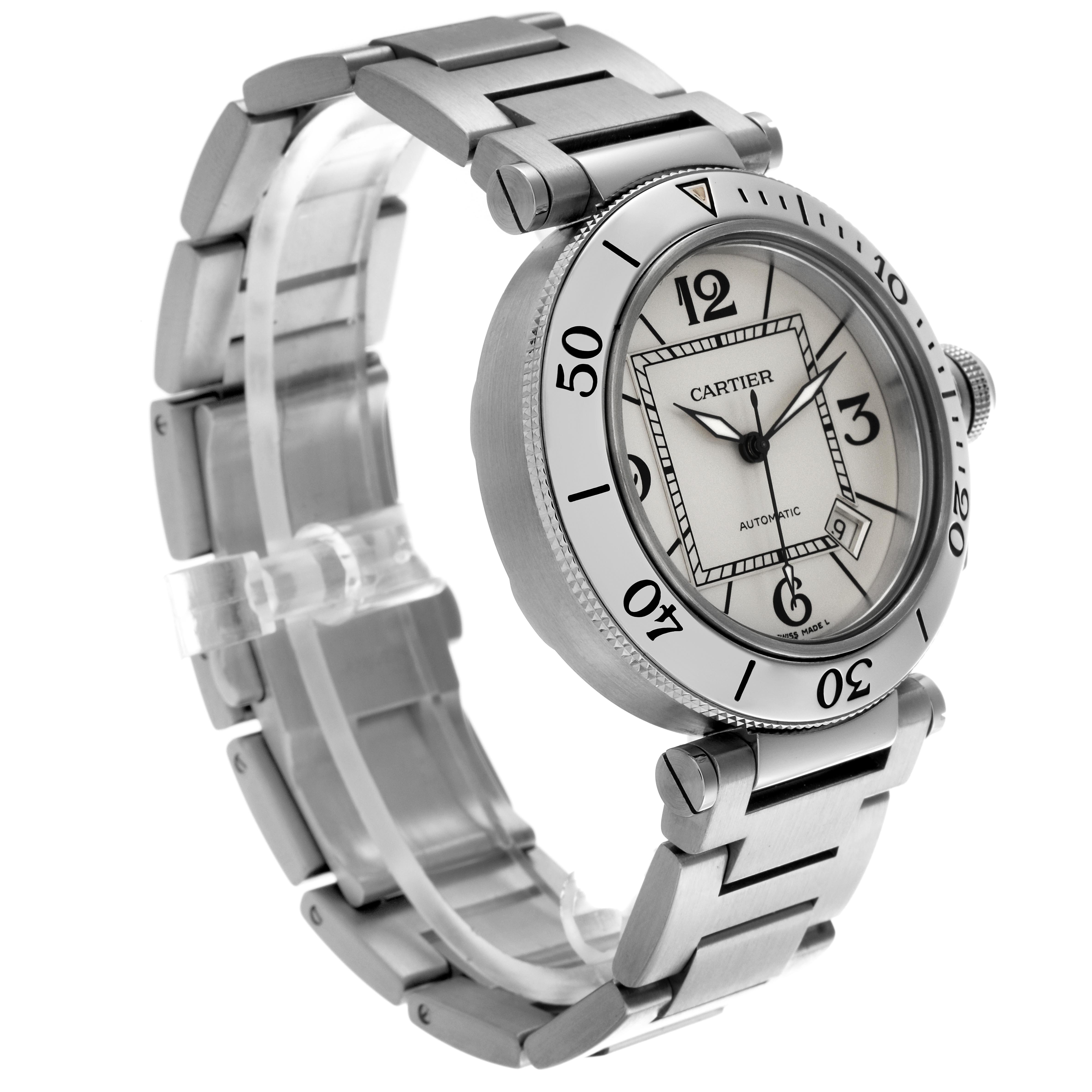 The Cartier Pasha W31080M7 Men
s Stainless Steel Silver Dial W31080M7 Men
s Stainless Steel Silver Dial watch is shown at a tilted angle, highlighting the face, bezel, crown, and metal bracelet.