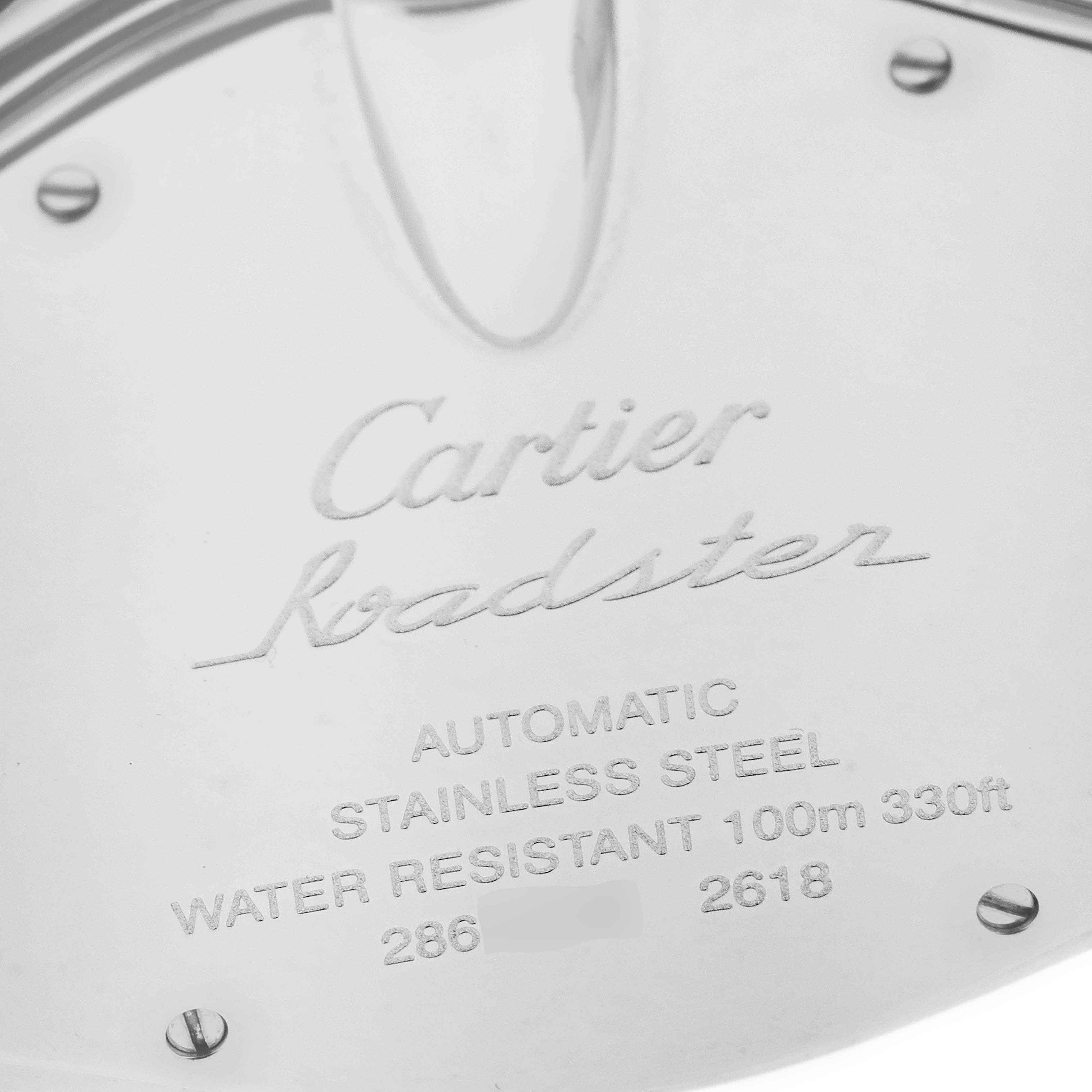 This is a close-up view of the back casing of the Cartier Roadster W62006X6 Men's Stainless Steel Silver Dial W62006X6 Men's Stainless Steel Silver Dial watch, showing the engraved details.