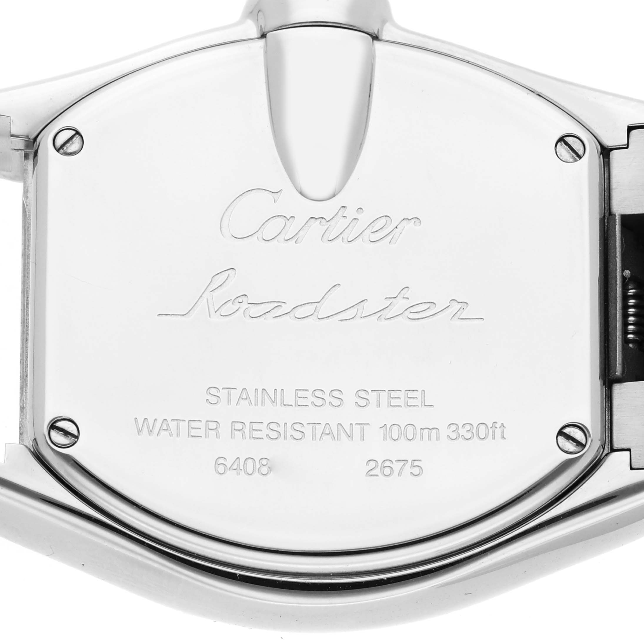 The image shows the back case of a Cartier Roadster W62016V3 Women
s Stainless Steel Silver Dial W62016V3 Women
s Stainless Steel Silver Dial watch, highlighting its polished stainless steel surface and inscriptions.