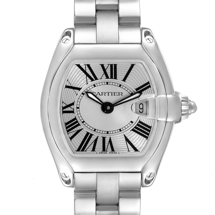 The Cartier Roadster watch is shown from a front angle, highlighting the dial, crown, and part of the bracelet.