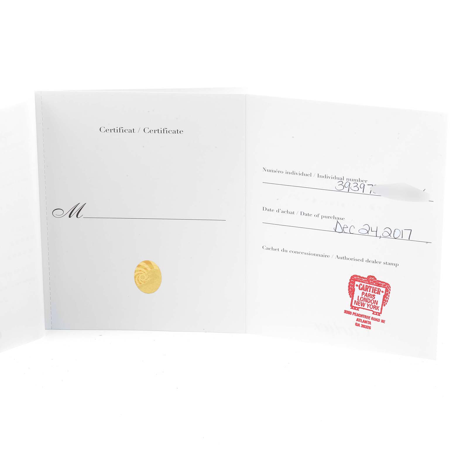 This image shows the certification booklet for a Ronde model by Cartier, open to display purchase details and a dealer stamp.