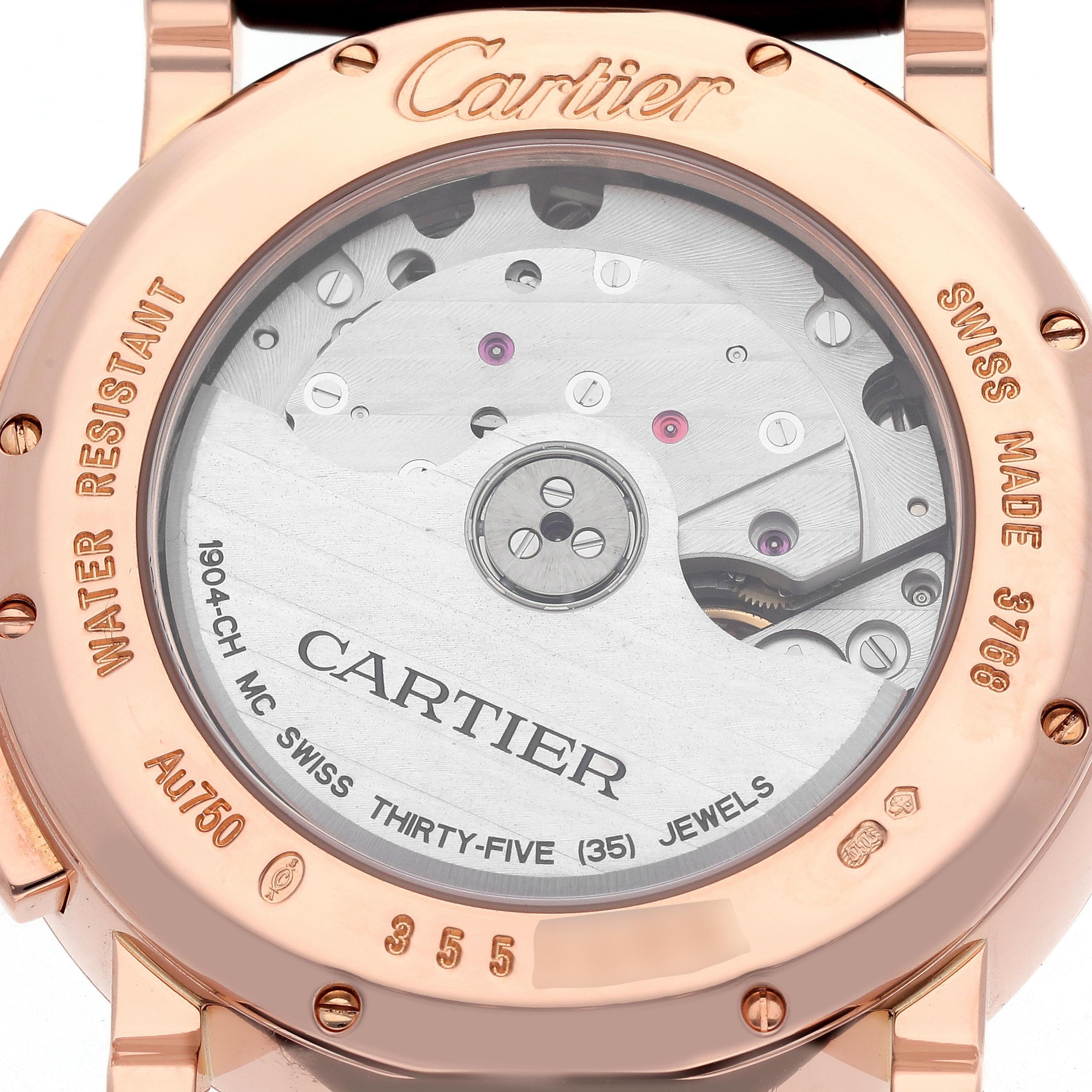 The image shows the back of the Cartier Rotonde W1556238 Men
s Rose Gold Silver Dial W1556238 Men
s Rose Gold Silver Dial watch, highlighting its mechanism and engraved details.