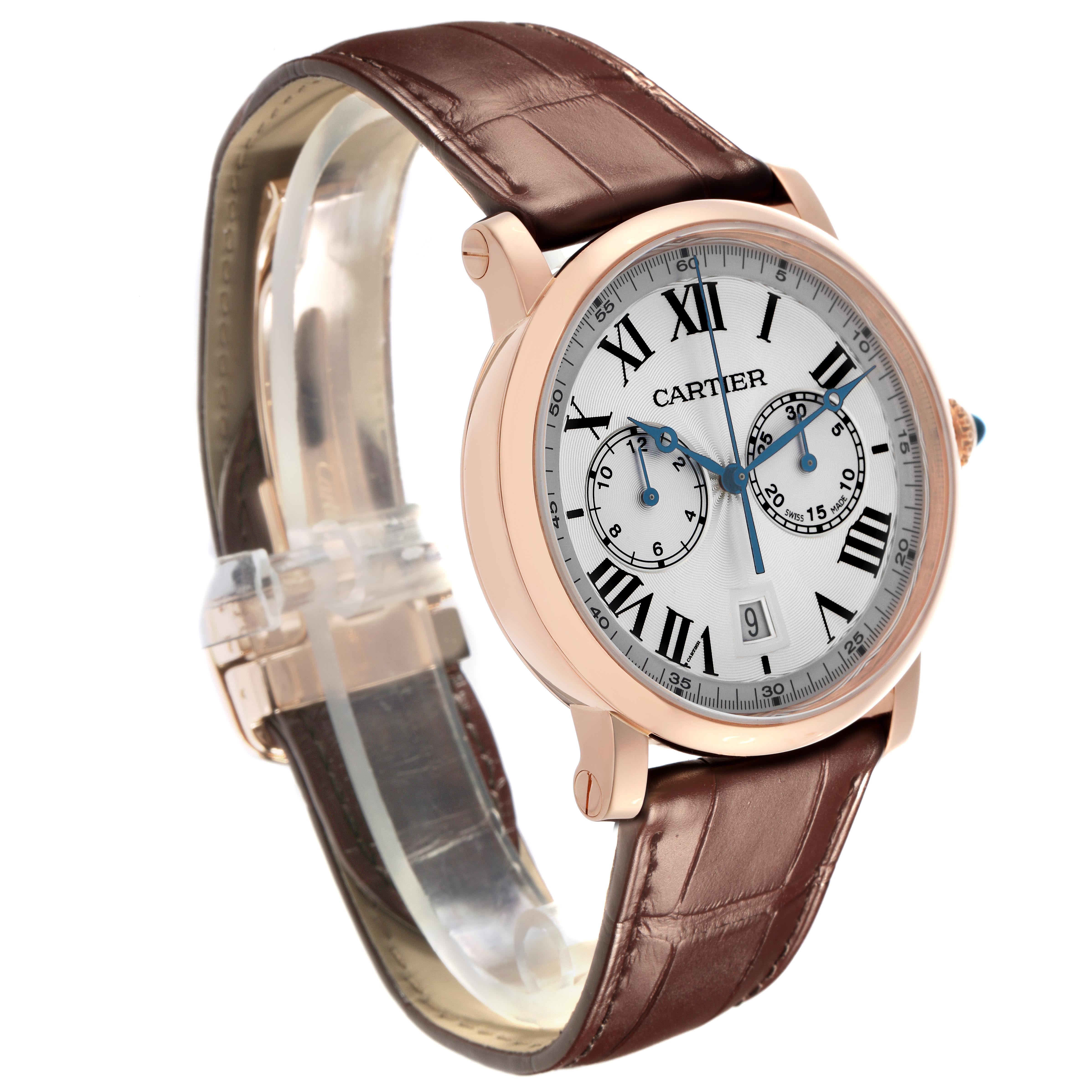 The Cartier Rotonde W1556238 Men
s Rose Gold Silver Dial W1556238 Men
s Rose Gold Silver Dial watch is shown at a 3/4 angle, featuring the dial, case, and brown leather strap.