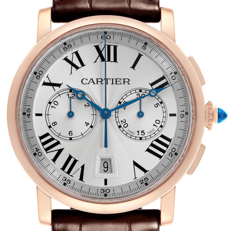 The Cartier Rotonde watch is shown from the front, highlighting its dial, Roman numerals, subdials, and crown with a blue gem.