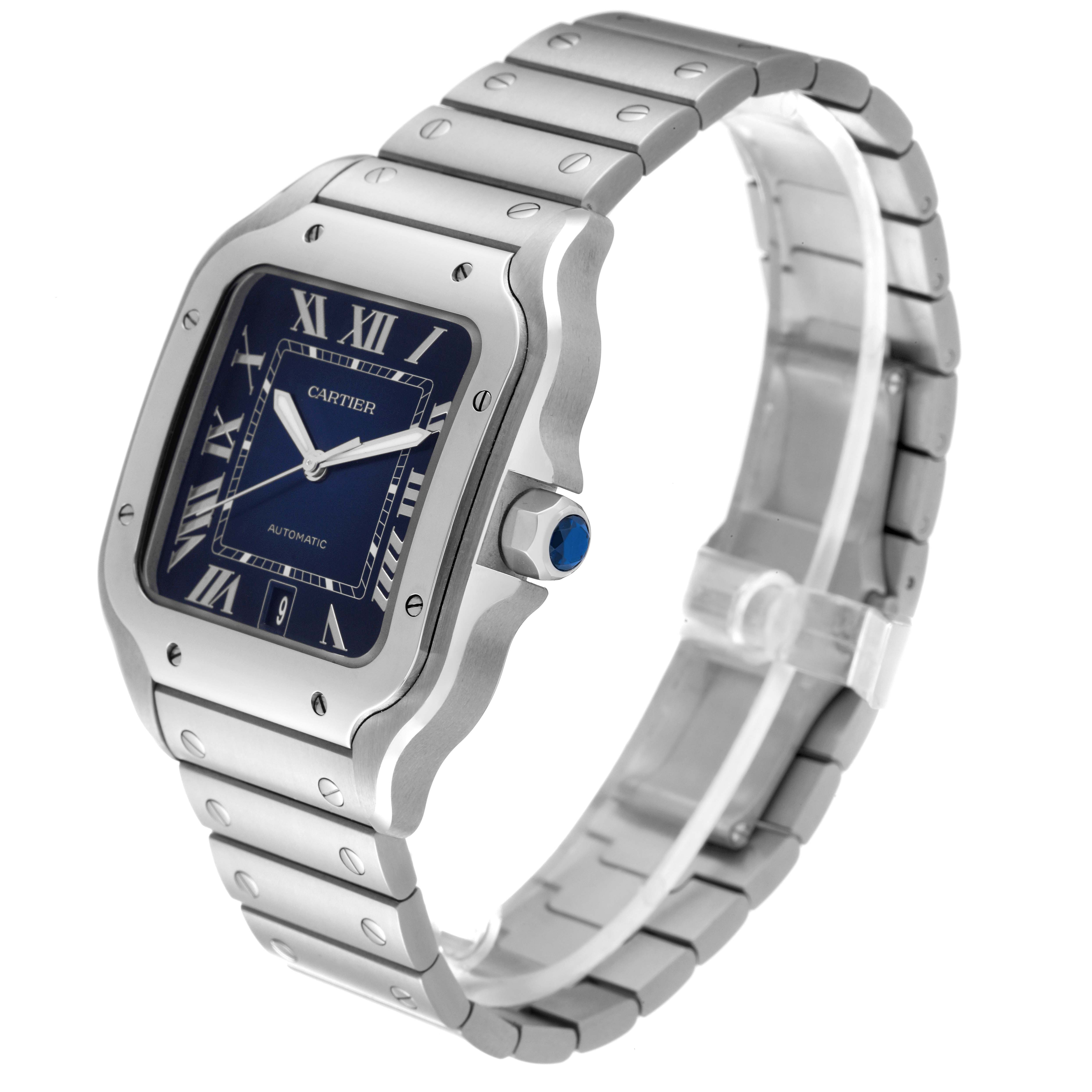 The image shows a side-angle view of the Cartier Santos WSSA0030 Men
s Stainless Steel Blue Dial WSSA0030 Men
s Stainless Steel Blue Dial watch, highlighting its bracelet, bezel, and blue dial.