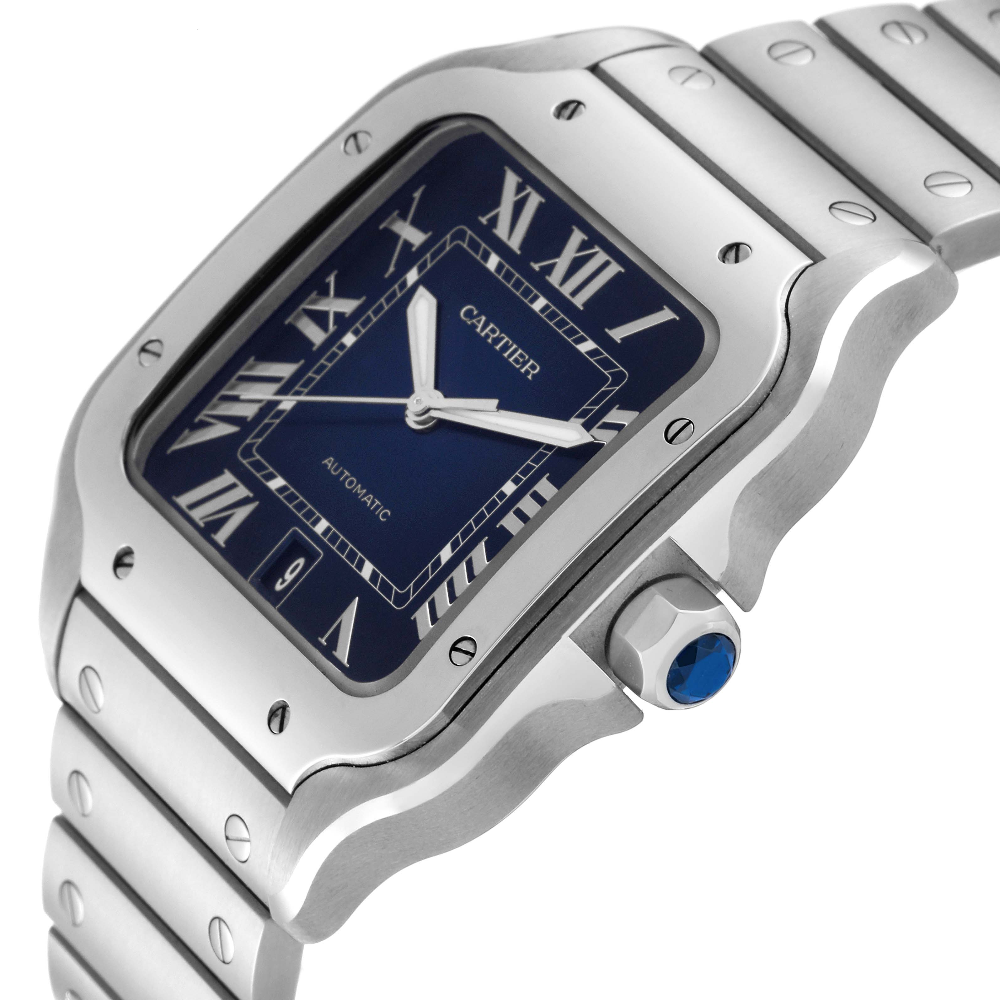 The image shows a close-up angle of a Cartier Santos WSSA0030 Men
s Stainless Steel Blue Dial WSSA0030 Men
s Stainless Steel Blue Dial watch, highlighting the face, bezel, and part of the bracelet.
