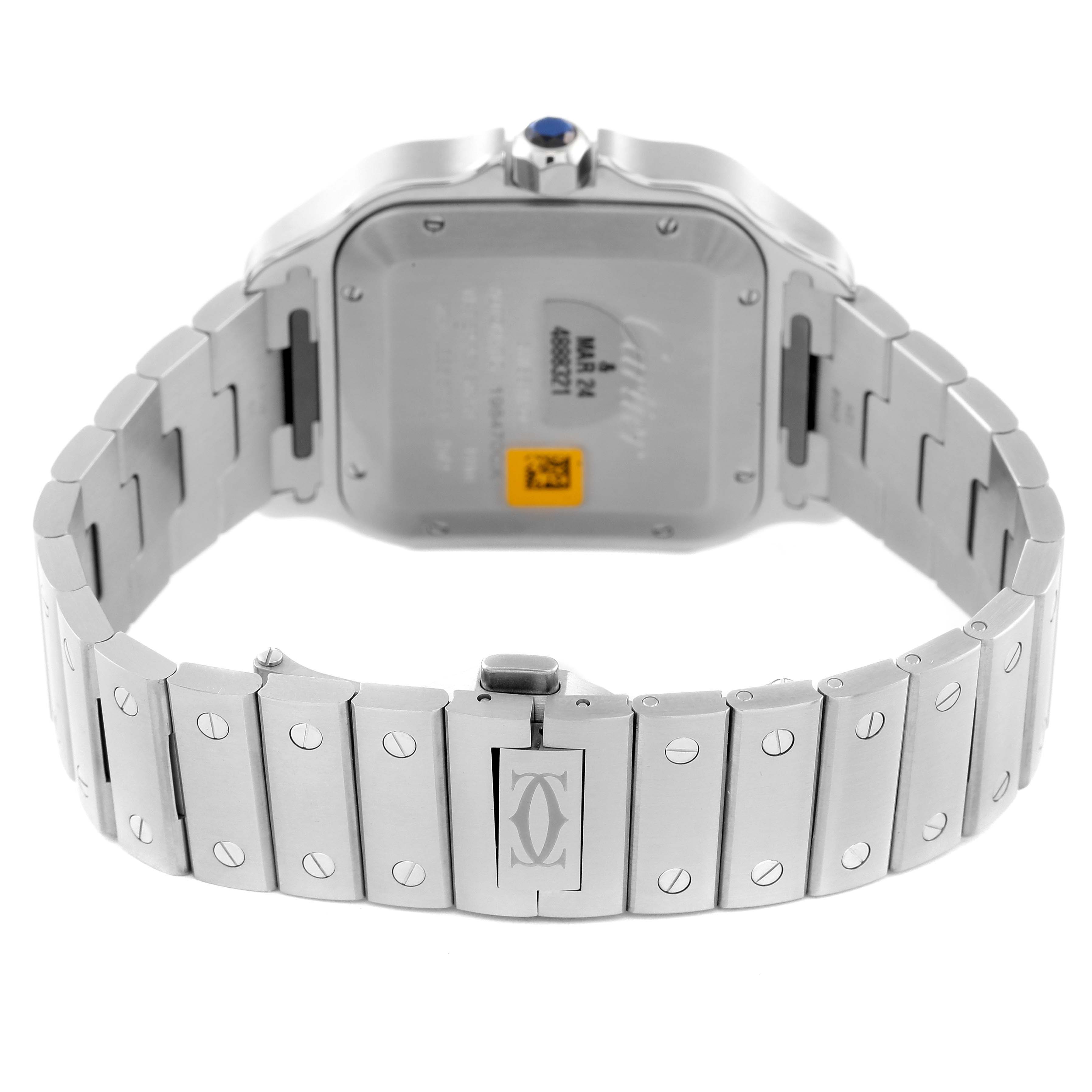 The image shows the back view of a Santos model by Cartier, including the bracelet, back case, and clasp.