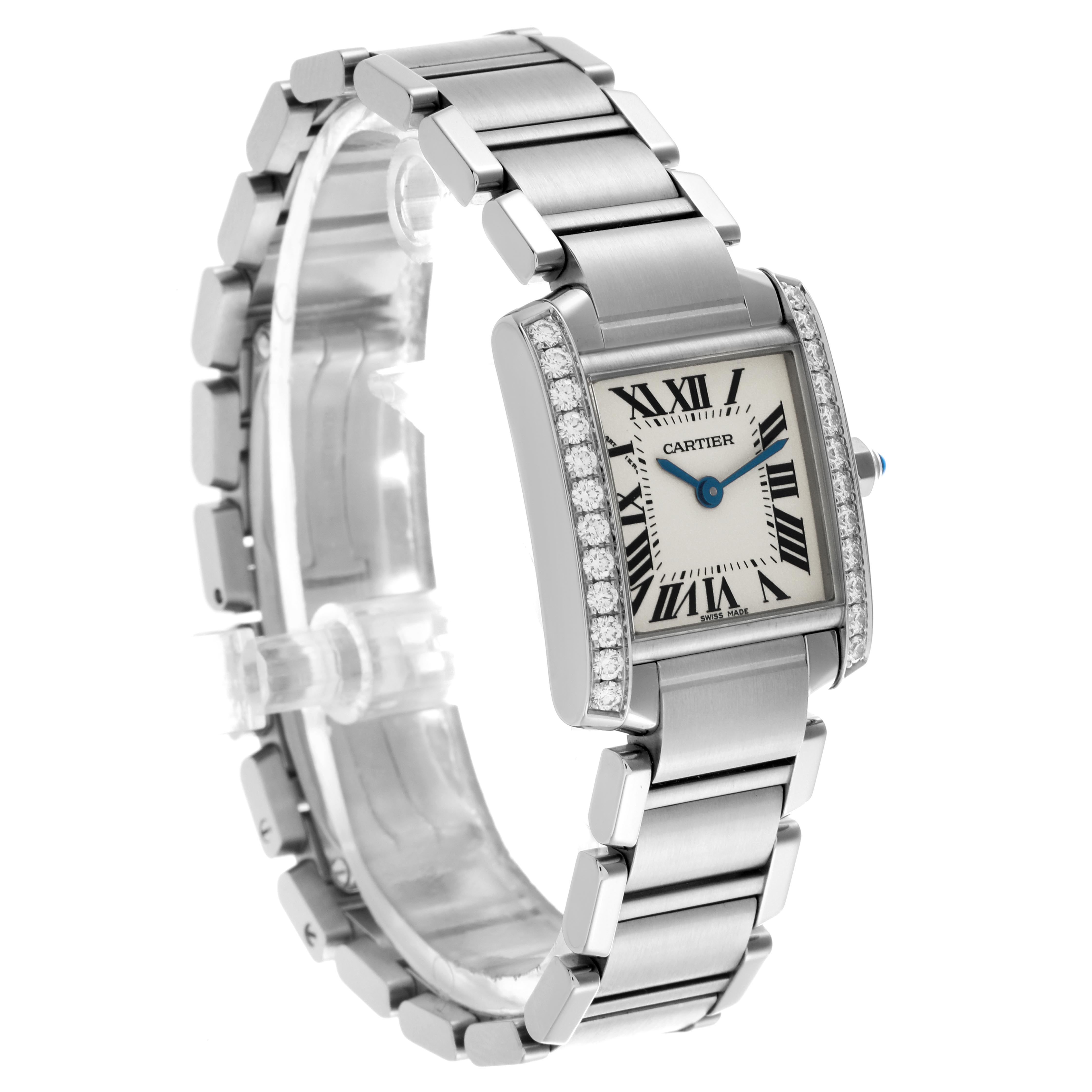 The Cartier Tank Française watch is shown at a three-quarter angle, displaying the bracelet and diamond-accented case.