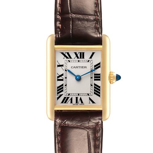 The Cartier Tank Louis watch is shown from a front angle, displaying the dial, brown leather strap, and gold crown with a blue cabochon.