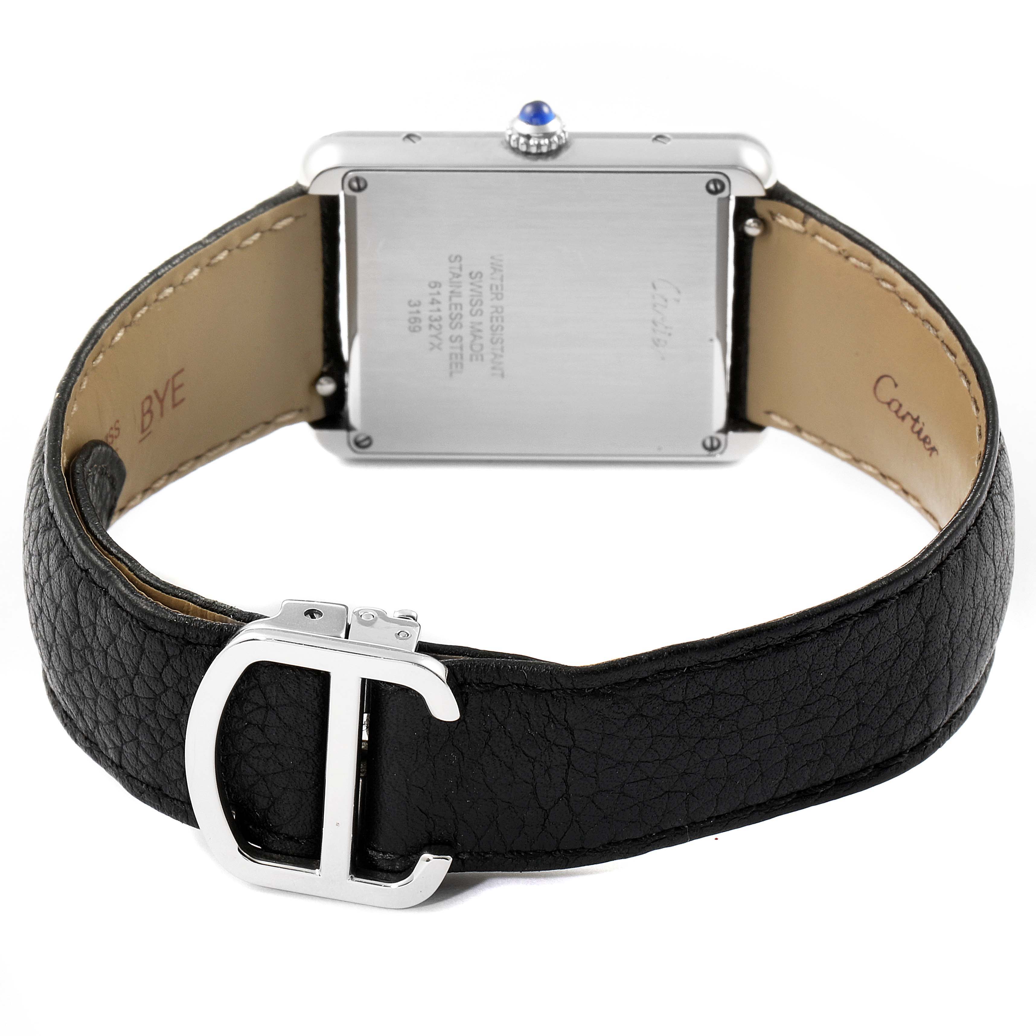 This image shows the back of the Cartier Tank Solo W1018355 Men's Stainless Steel Silver Dial W1018355 Men's Stainless Steel Silver Dial watch and black leather strap with the buckle visible.