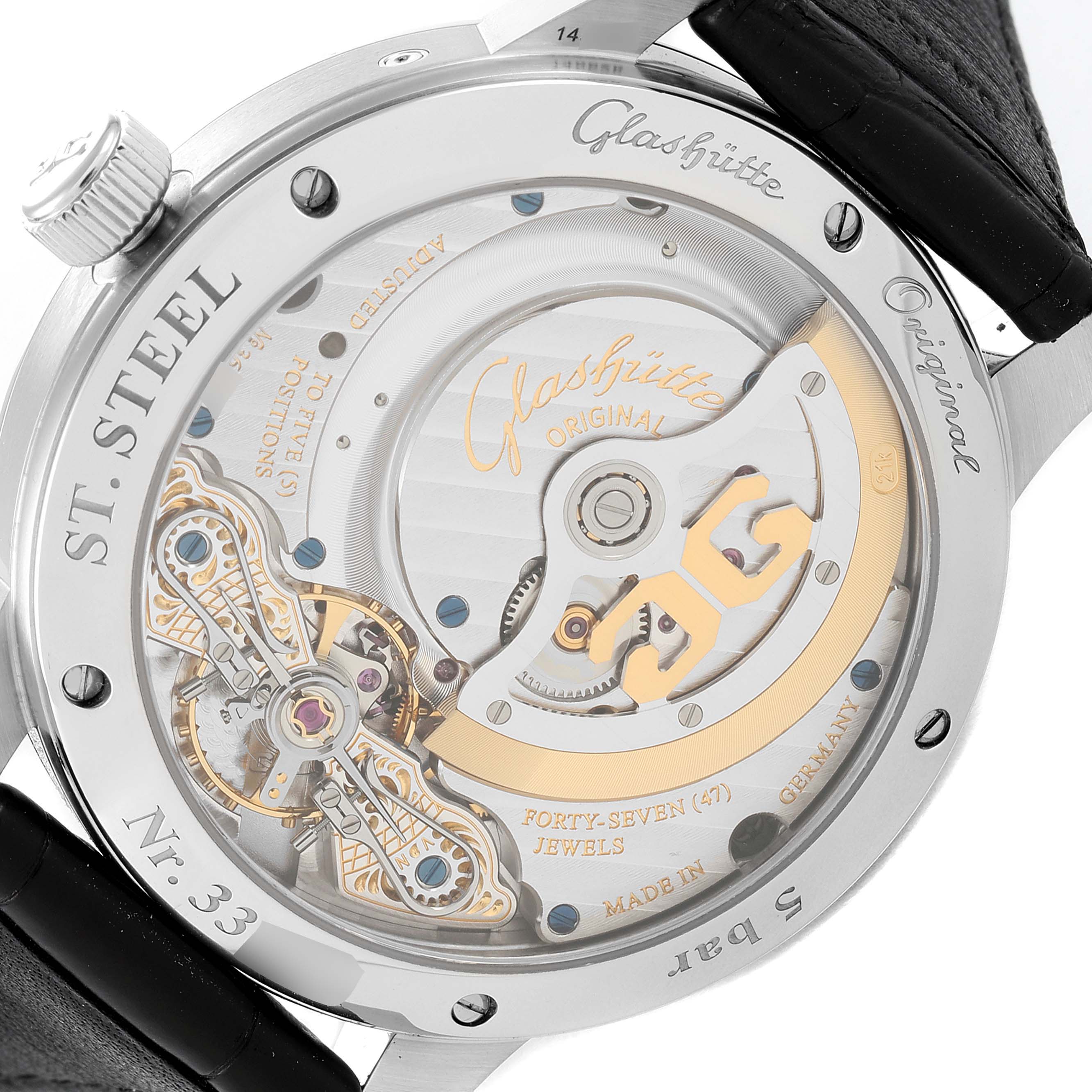 The image shows the back view of the Glashütte Pano model, highlighting its intricate mechanical movement and engravings.
