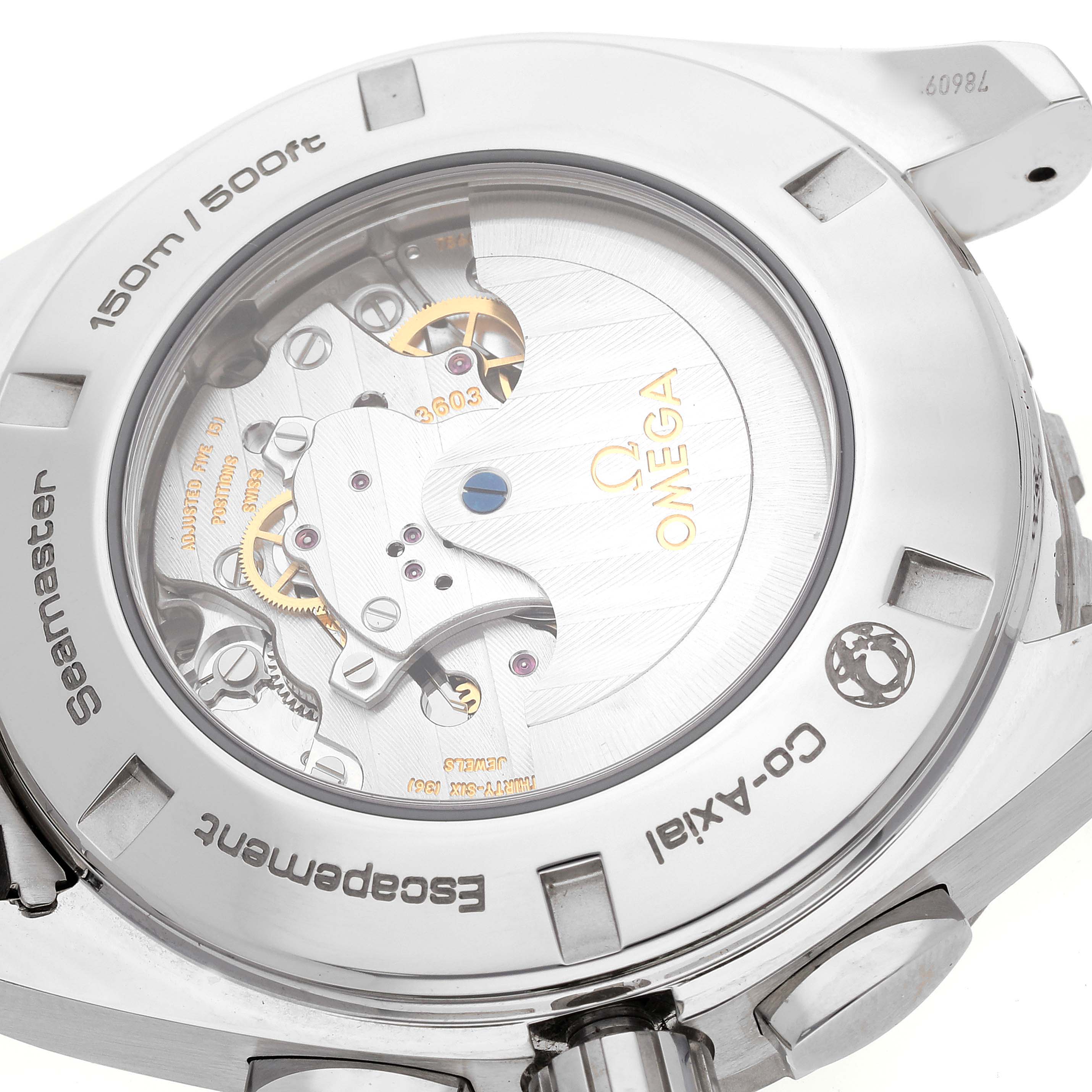 The image shows the back view of an Omega Aqua Terra 231.10.44.52.04.001 Men
s Stainless Steel White Dial 231.10.44.52.04.001 Men
s Stainless Steel White Dial watch, highlighting its movement and intricate internal components.