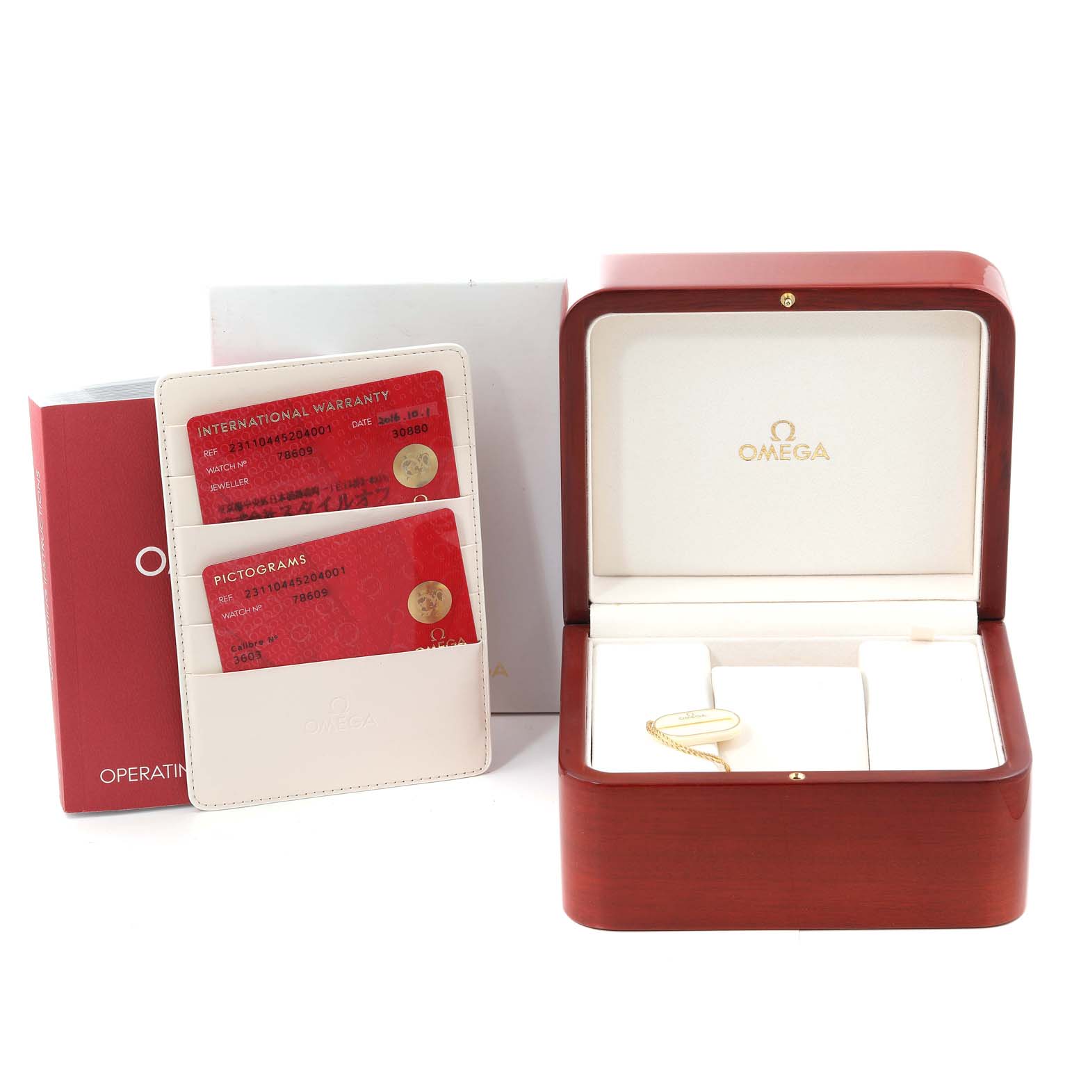 The image shows the packaging and accessories for an Omega Aqua Terra 231.10.44.52.04.001 Men
s Stainless Steel White Dial 231.10.44.52.04.001 Men
s Stainless Steel White Dial watch, including a presentation box, warranty cards, and an operating manual.