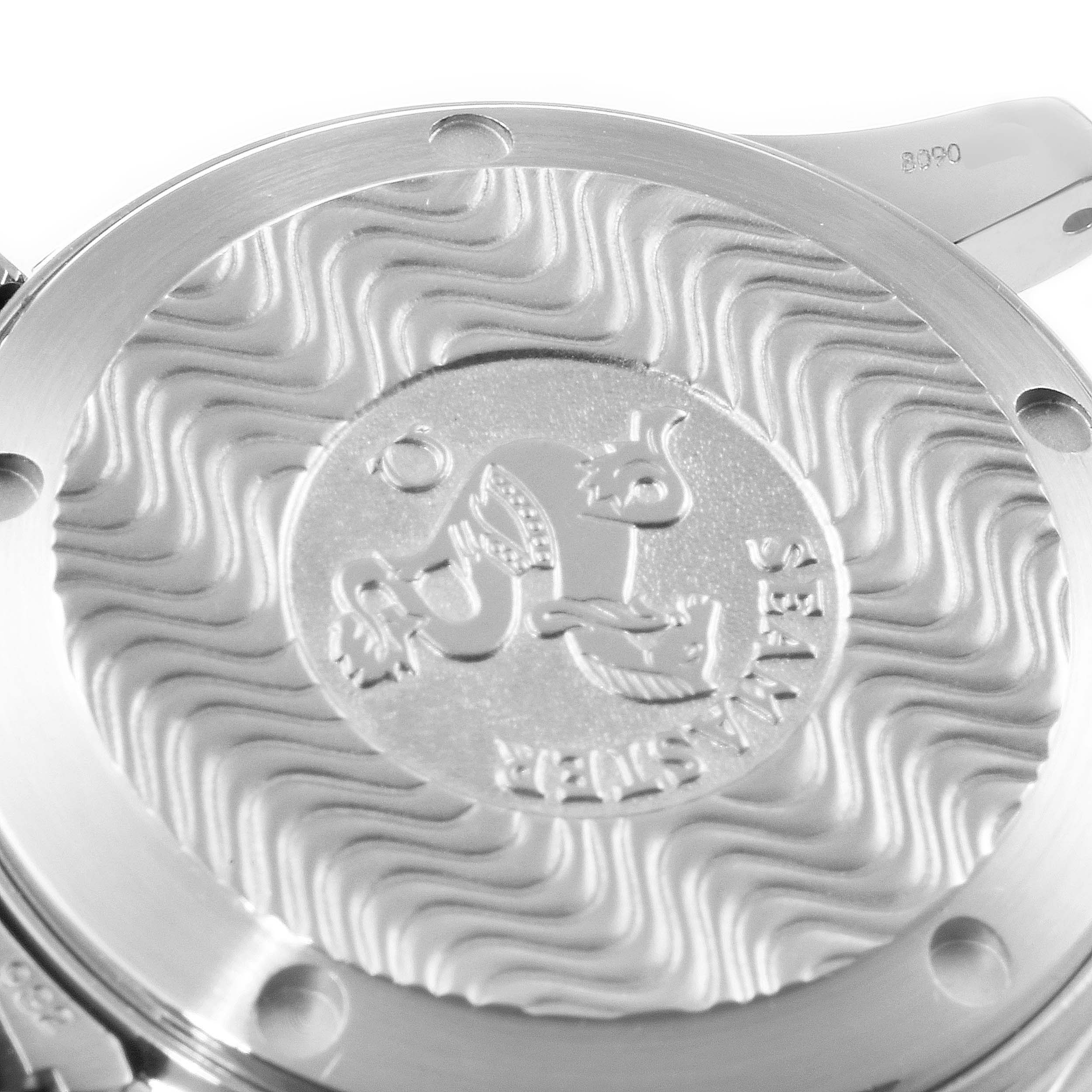 The image shows the case back of the Omega Seamaster 2252.50.00 Men
s Stainless Steel Black Dial 2252.50.00 Men
s Stainless Steel Black Dial watch featuring the embossed logo and wave pattern.