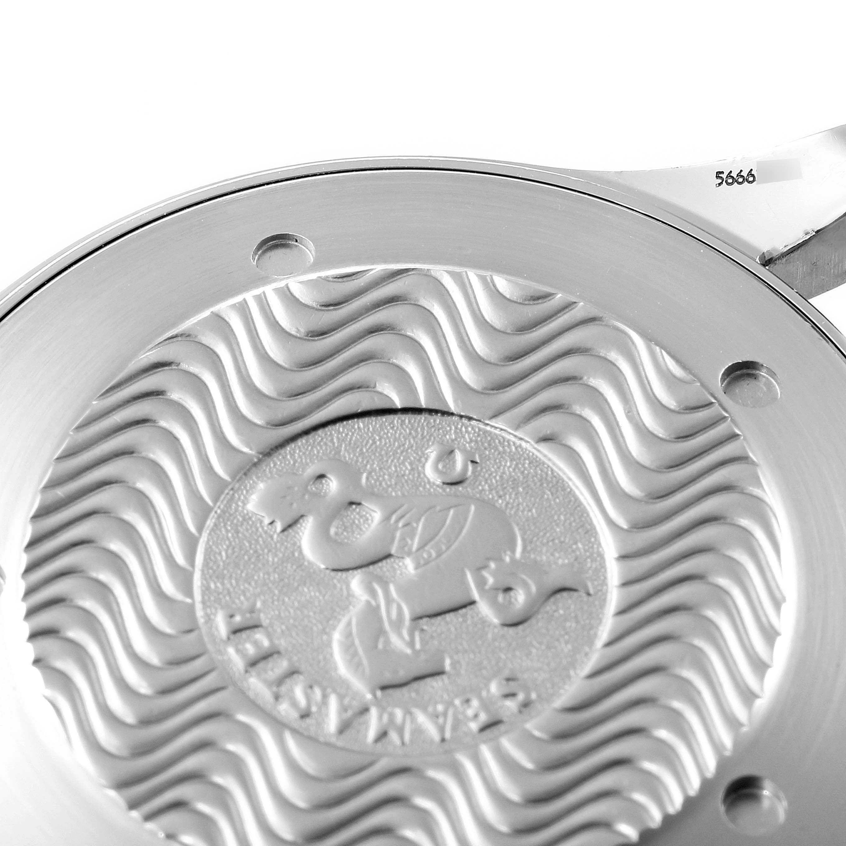 This close-up image shows the case back of an Omega Seamaster 2541.80.00 Men
s Stainless Steel Blue Dial 2541.80.00 Men
s Stainless Steel Blue Dial watch, featuring the engraved logo and wave pattern.