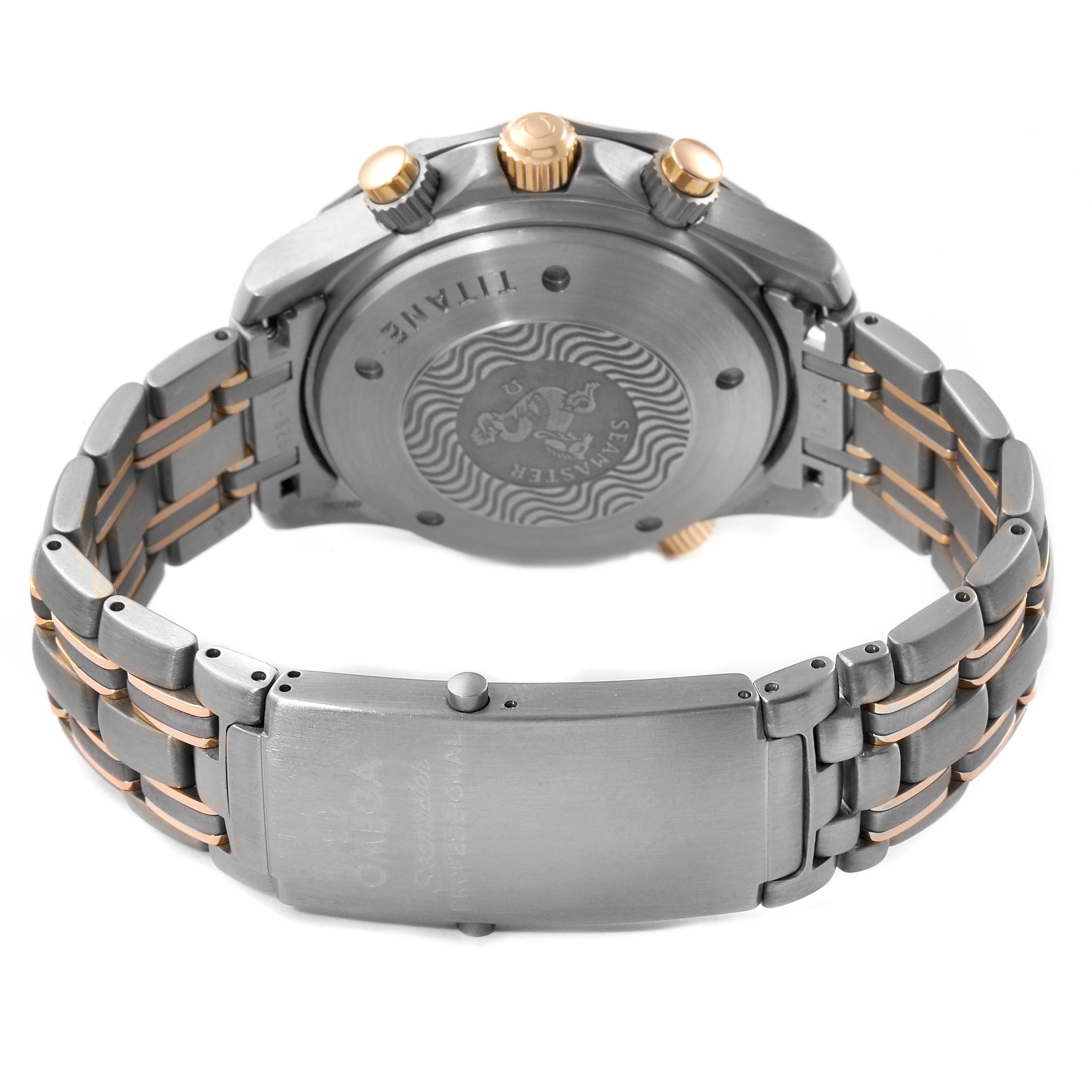 The image shows the back view of an Omega Seamaster 2296.80.00 Men
s Titanium Blue Dial 2296.80.00 Men
s Titanium Blue Dial watch, highlighting the clasp, case back, and pushers.