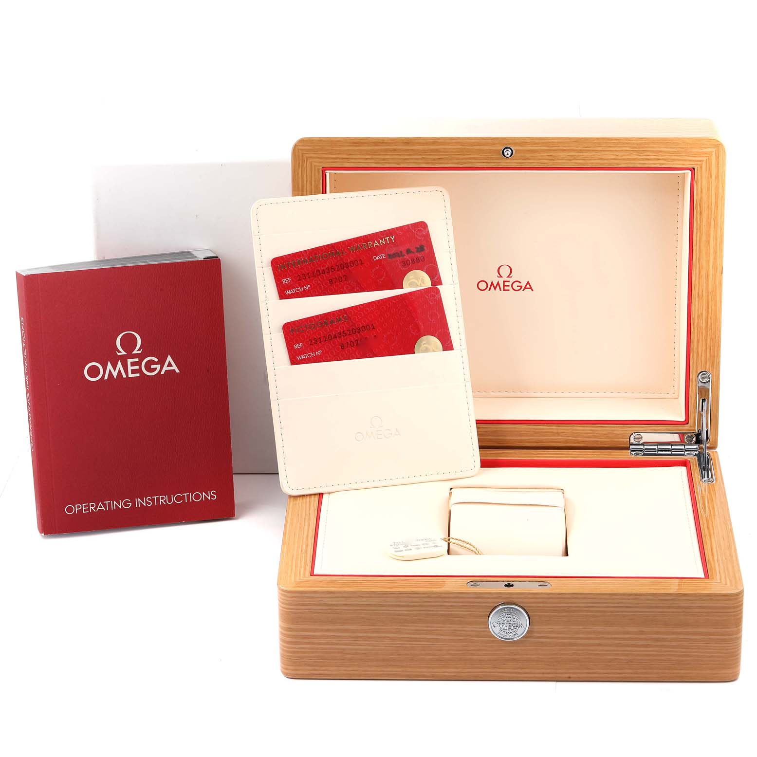 The image shows the Omega Aqua Terra 231.10.43.52.03.001 Men's Stainless Steel Blue Dial 231.10.43.52.03.001 Men's Stainless Steel Blue Dial model's box, warranty cards, and operating instructions from a front angle.