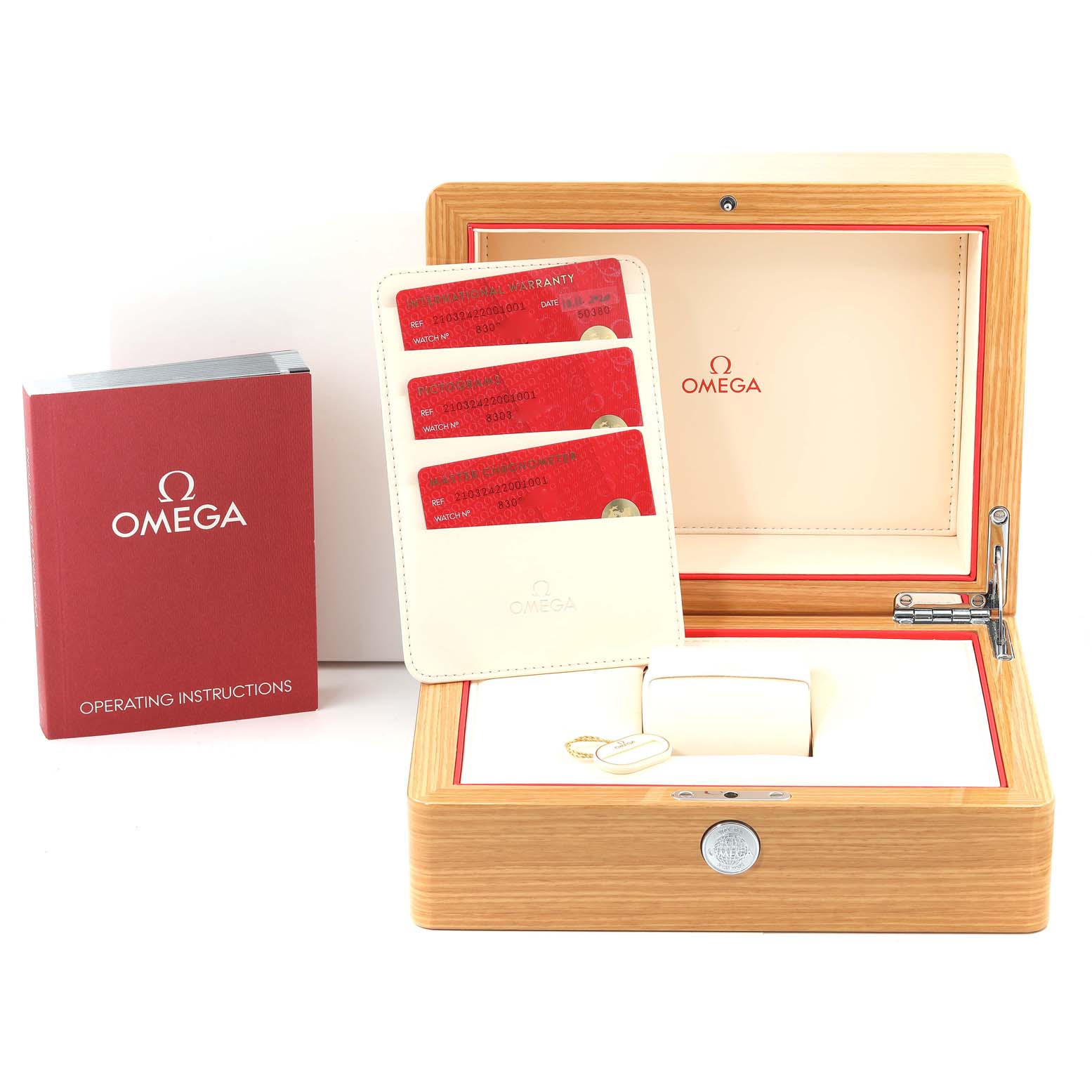 This image shows an Omega Seamaster 210.32.42.20.01.001 Men's Stainless Steel Black Dial 210.32.42.20.01.001 Men's Stainless Steel Black Dial box, operating instructions, and warranty cards from a frontal angle.