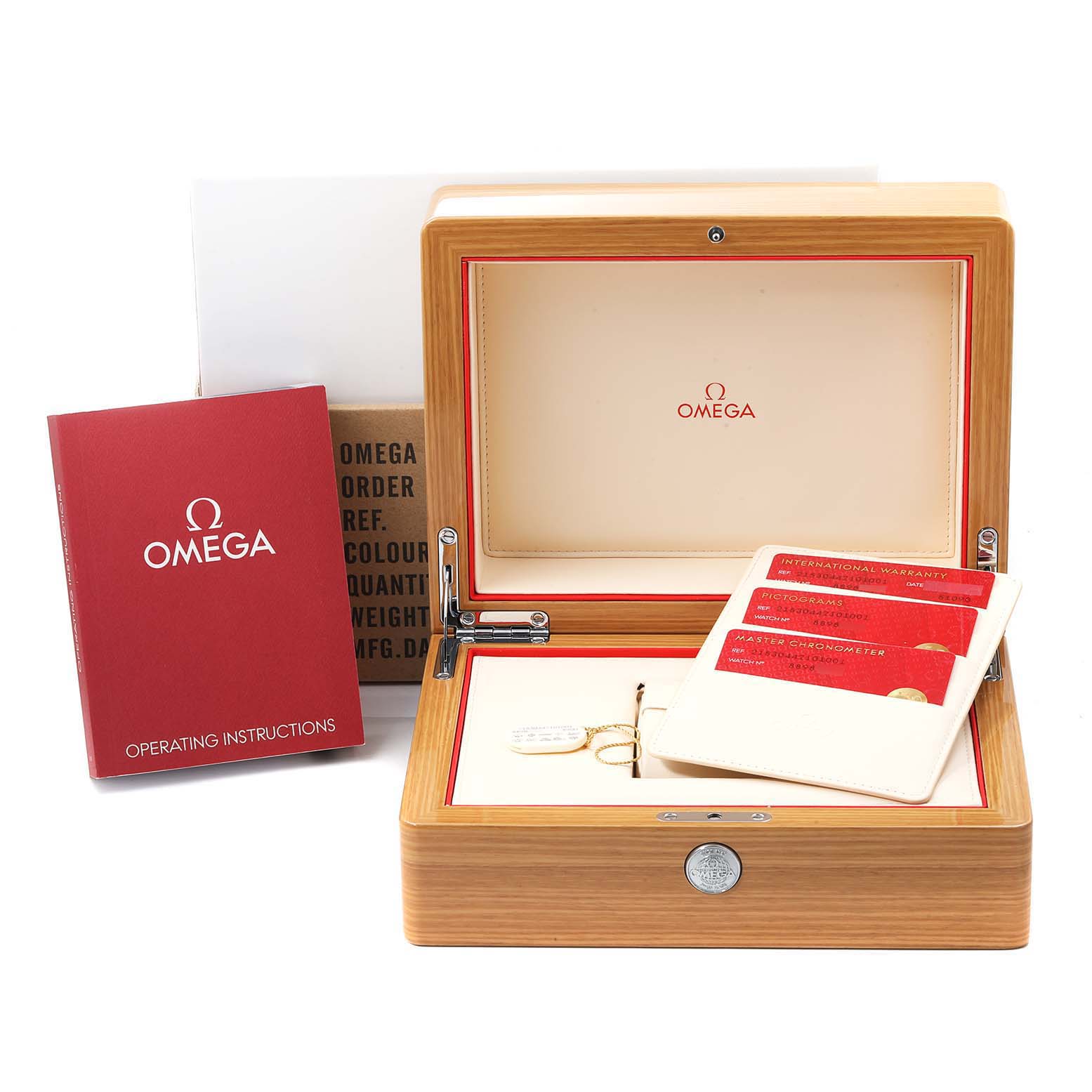 This image shows the open box, instruction manual, and warranty cards for the Omega Planet Ocean 215.30.44.21.01.001 Men
s Stainless Steel Black Dial 215.30.44.21.01.001 Men
s Stainless Steel Black Dial model watch.