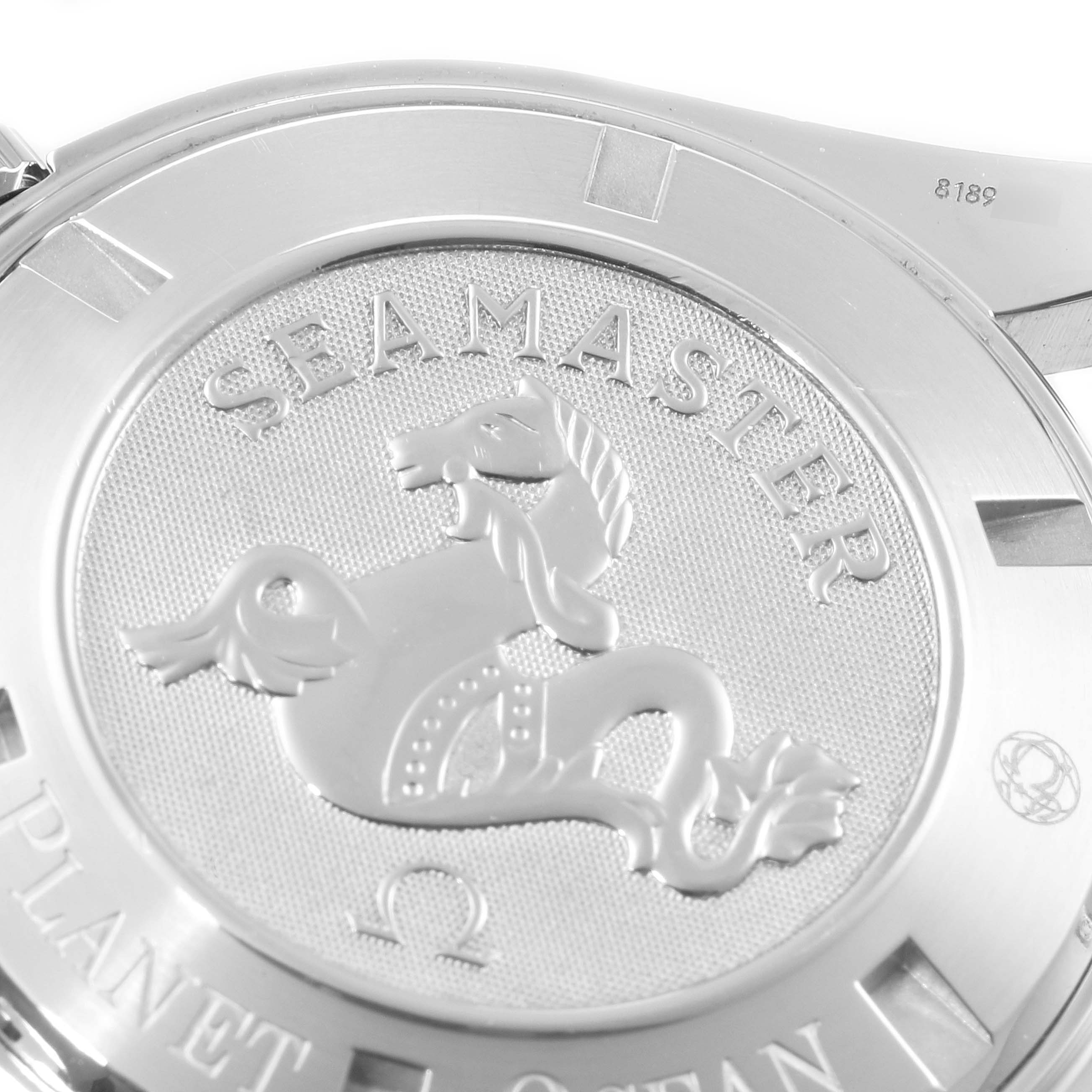 The image shows the case back of the Omega Planet Ocean 2209.50.00 Men
s Stainless Steel Black Dial 2209.50.00 Men
s Stainless Steel Black Dial Seamaster watch featuring the branding and an engraved seahorse.