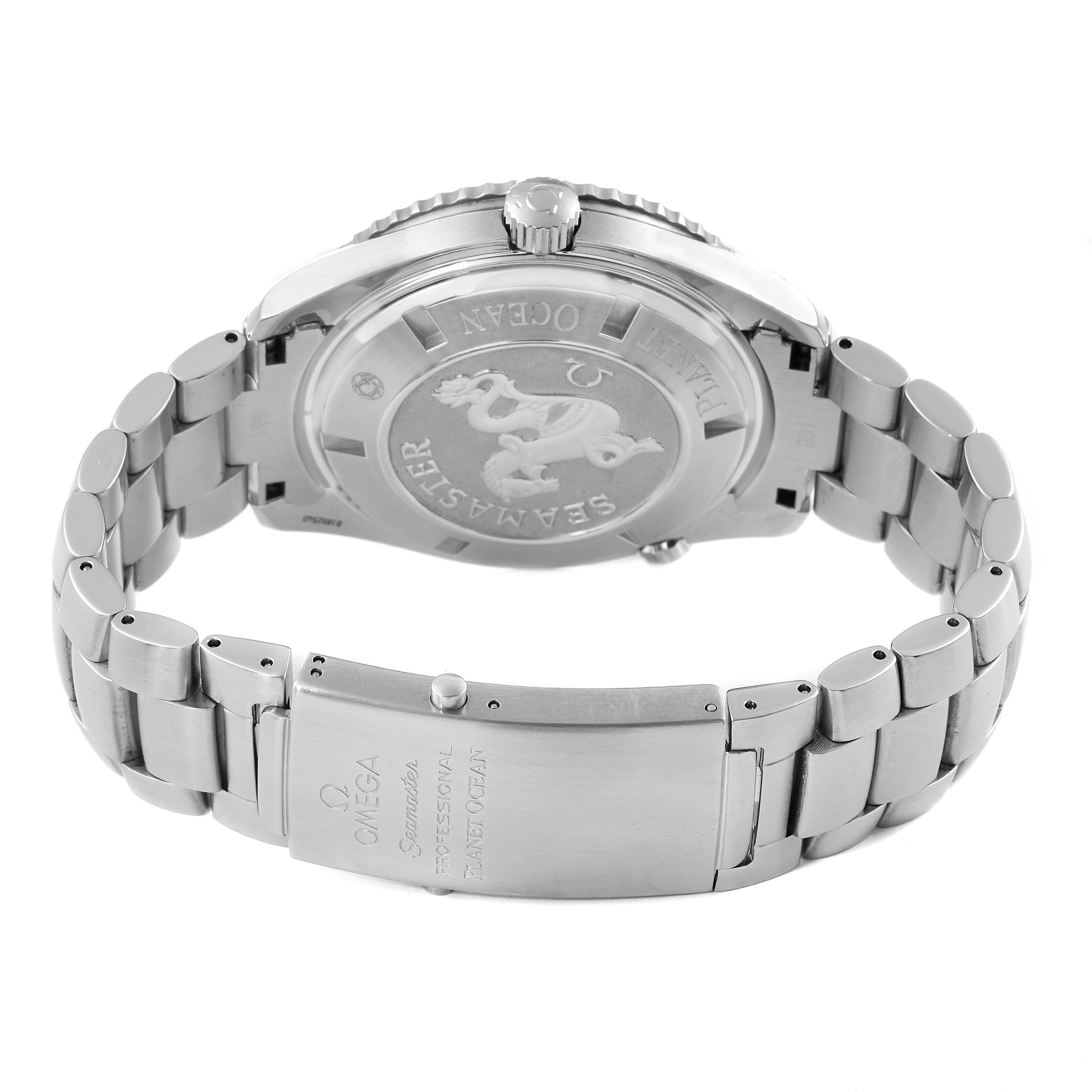 This image shows the backside and clasp of an Omega Planet Ocean 2209.50.00 Men
s Stainless Steel Black Dial 2209.50.00 Men
s Stainless Steel Black Dial watch, highlighting the engraved case back and metal bracelet.