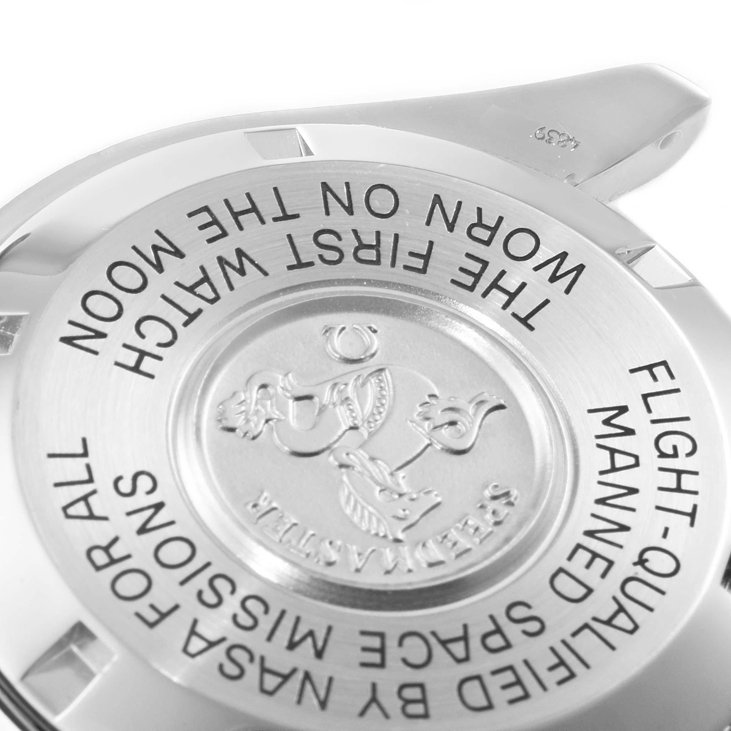 The image shows the case back of the Omega Speedmaster 3570.50.00 Men
s Stainless Steel Black Dial 3570.50.00 Men
s Stainless Steel Black Dial, highlighting the engraved text and logo.