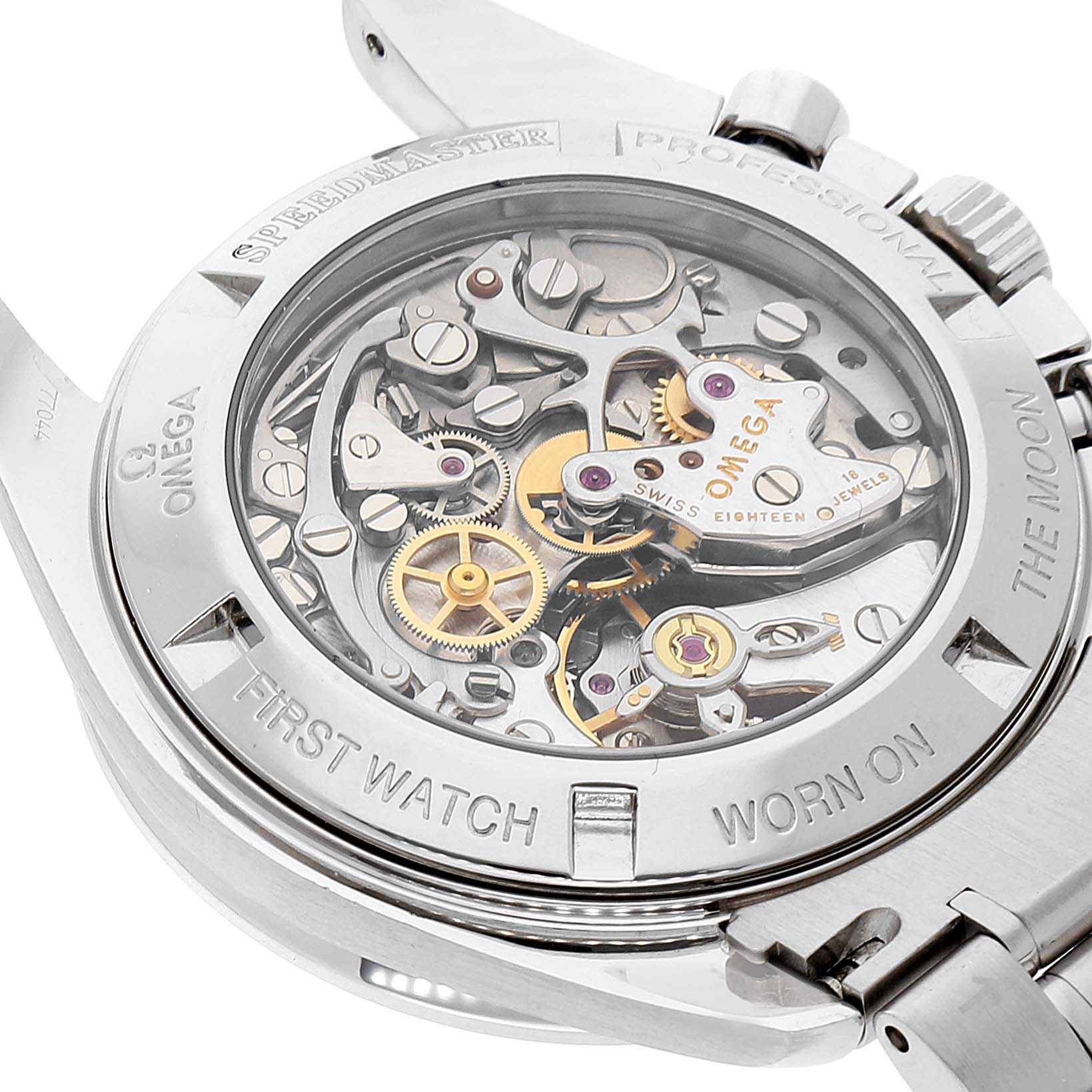 The image shows the case back of an Omega Speedmaster 3572.50.00 Men
s Stainless Steel Black Dial 3572.50.00 Men
s Stainless Steel Black Dial watch, revealing its intricate mechanical movement and inner components.