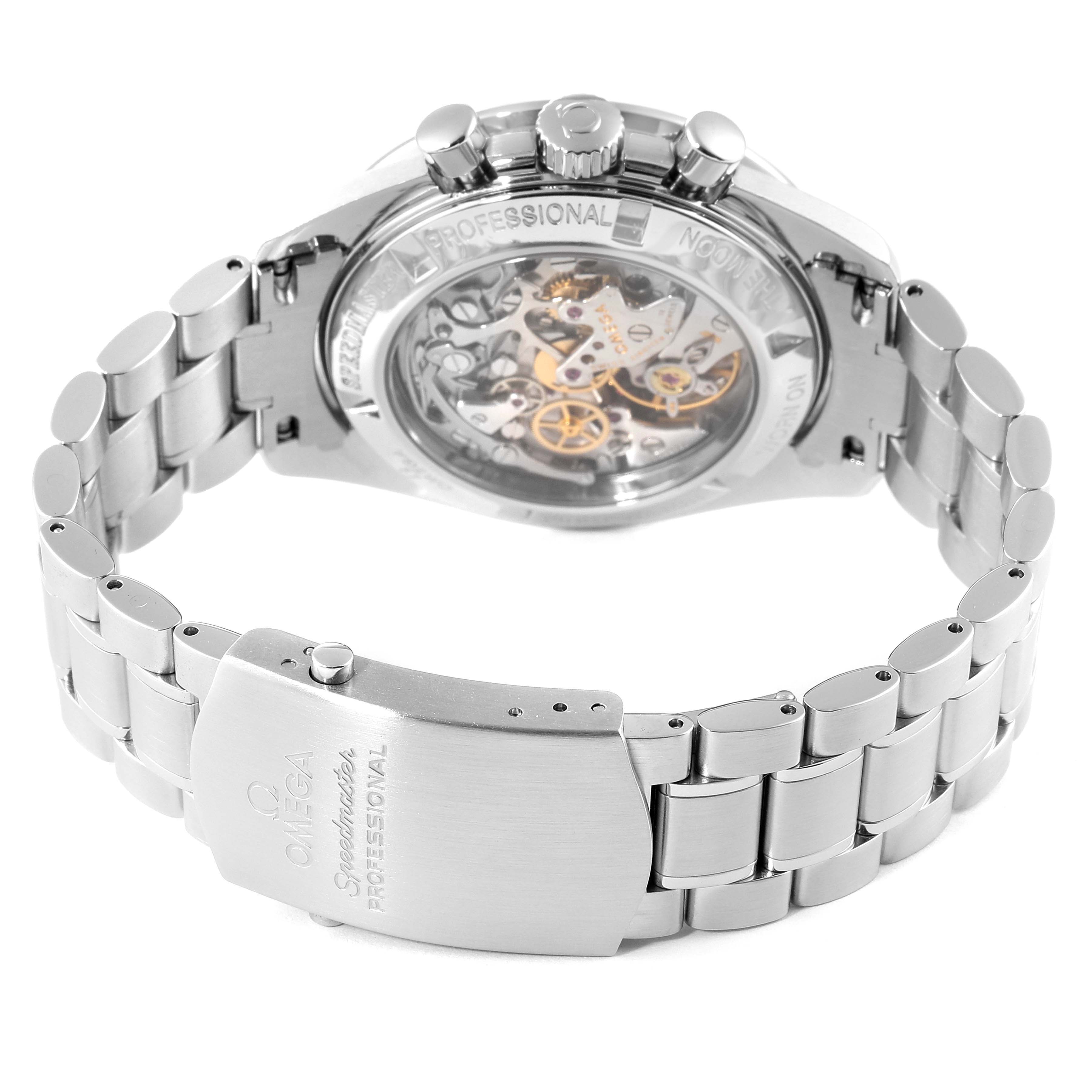 The image shows the back view of an Omega Speedmaster 3572.50.00 Men
s Stainless Steel Black Dial 3572.50.00 Men
s Stainless Steel Black Dial watch, highlighting the transparent case back and stainless steel bracelet.