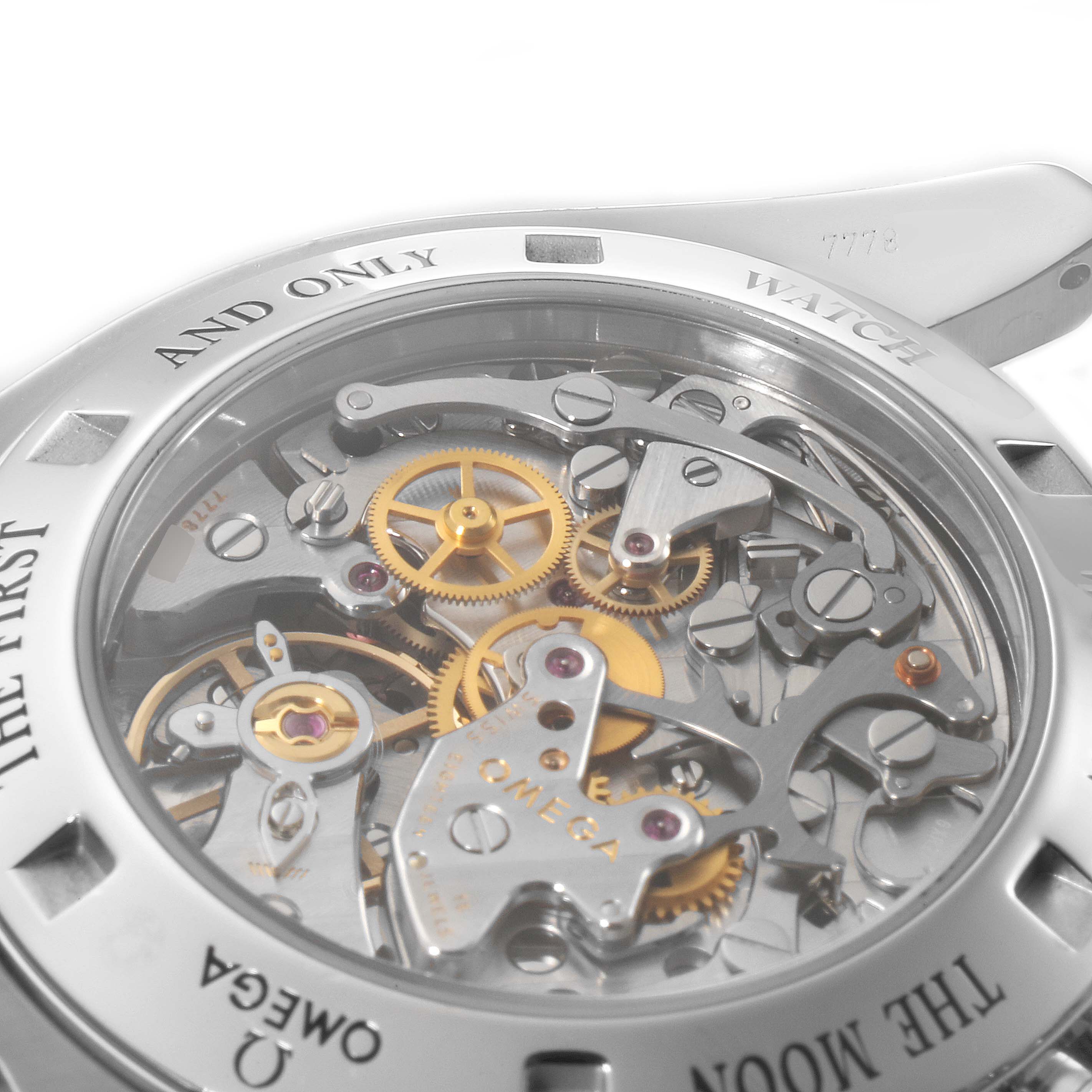 The image shows the intricate movement and gears visible through the transparent case back of an Omega Speedmaster 311.30.42.30.01.006 Men
s Stainless Steel Black Dial 311.30.42.30.01.006 Men
s Stainless Steel Black Dial watch.