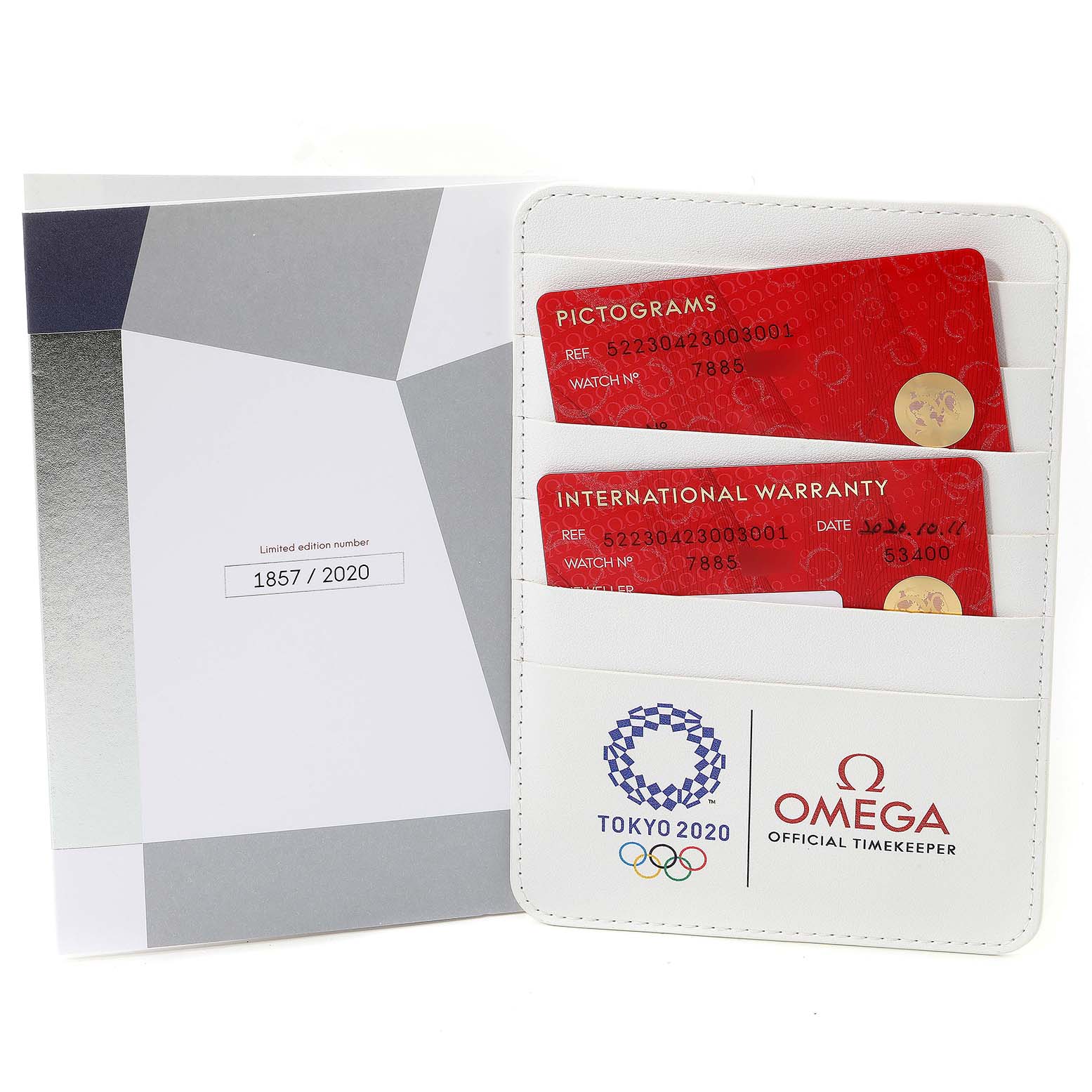 The image shows the international warranty, pictograms cards, and documentation for the Omega Speedmaster 522.30.42.30.03.001 Men's Stainless Steel Blue Dial 522.30.42.30.03.001 Men's Stainless Steel Blue Dial watch.