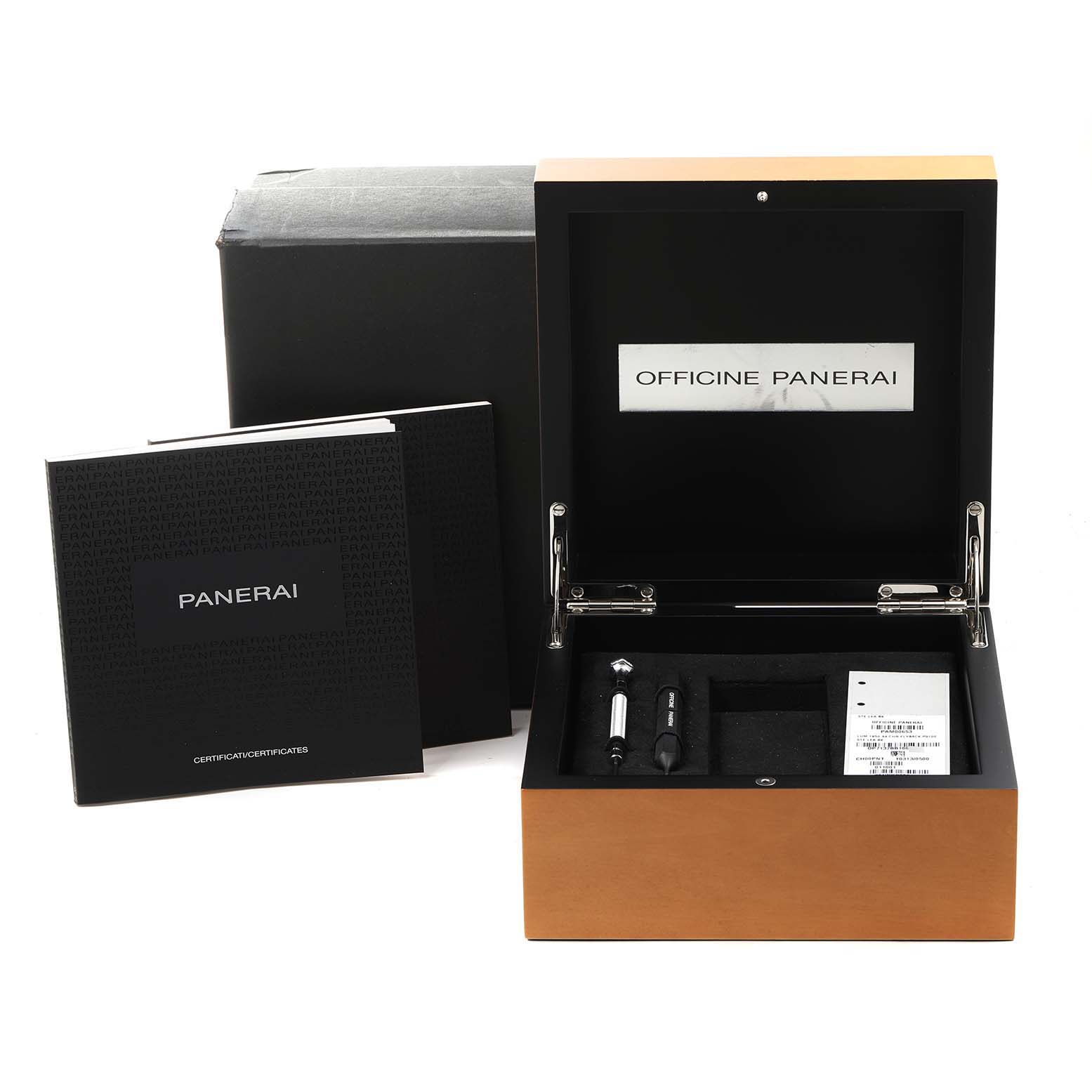 The image shows an open Panerai Luminor PAM00653 Men
s Stainless Steel Black Dial PAM00653 Men
s Stainless Steel Black Dial watch box with manuals and accessories viewed from the front angle.