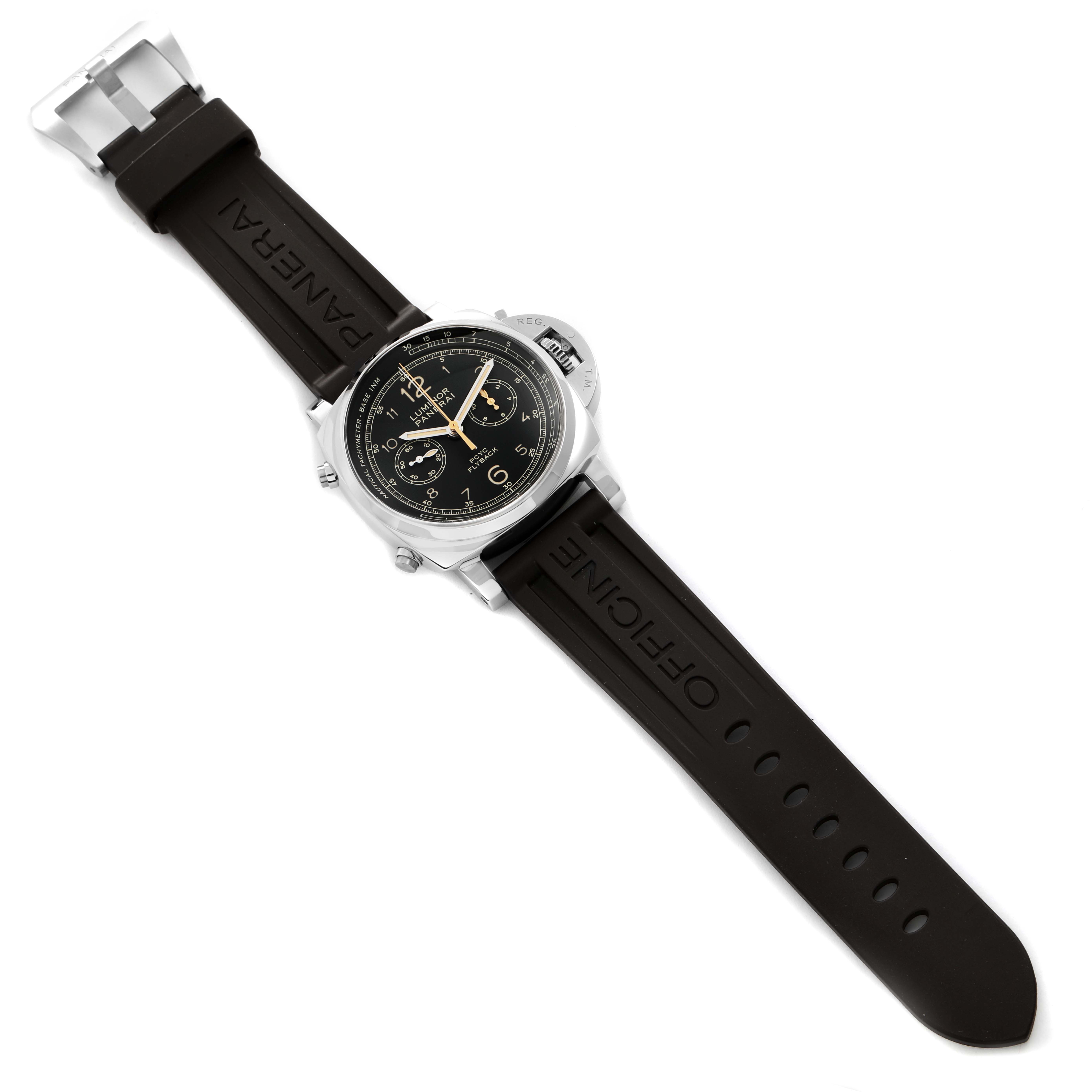 The image shows a top view of a Panerai Luminor PAM00653 Men
s Stainless Steel Black Dial PAM00653 Men
s Stainless Steel Black Dial watch with a black dial and rubber strap.