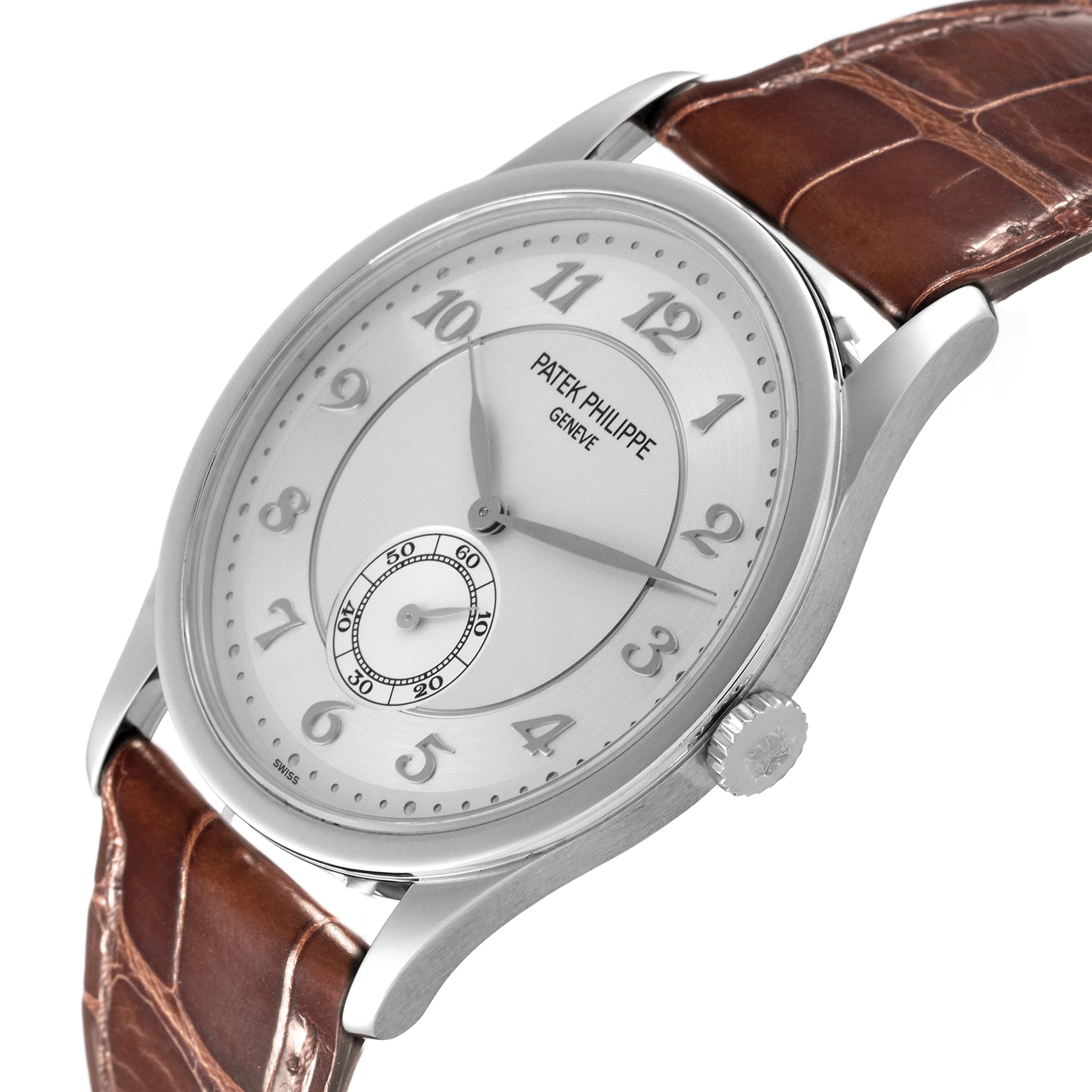 The Patek Philippe Calatrava 5196P-001 Men's Platinum Silver Dial watch is shown at a slight angle, highlighting the dial, case, crown, and brown leather strap.