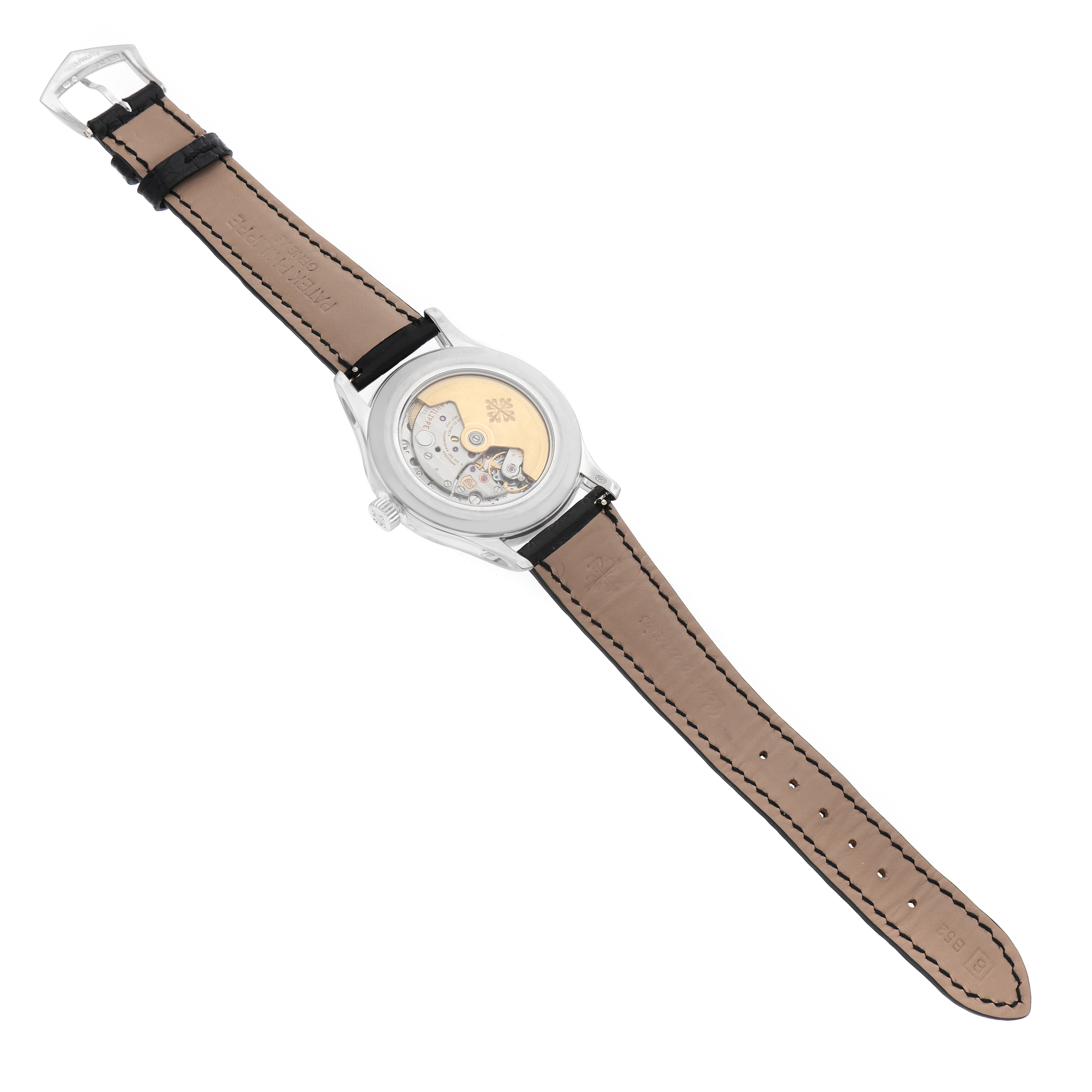 The Patek Philippe Complications 5205G-010 Men's White Gold Grey Dial watch is shown from the back, highlighting the movement and leather strap.