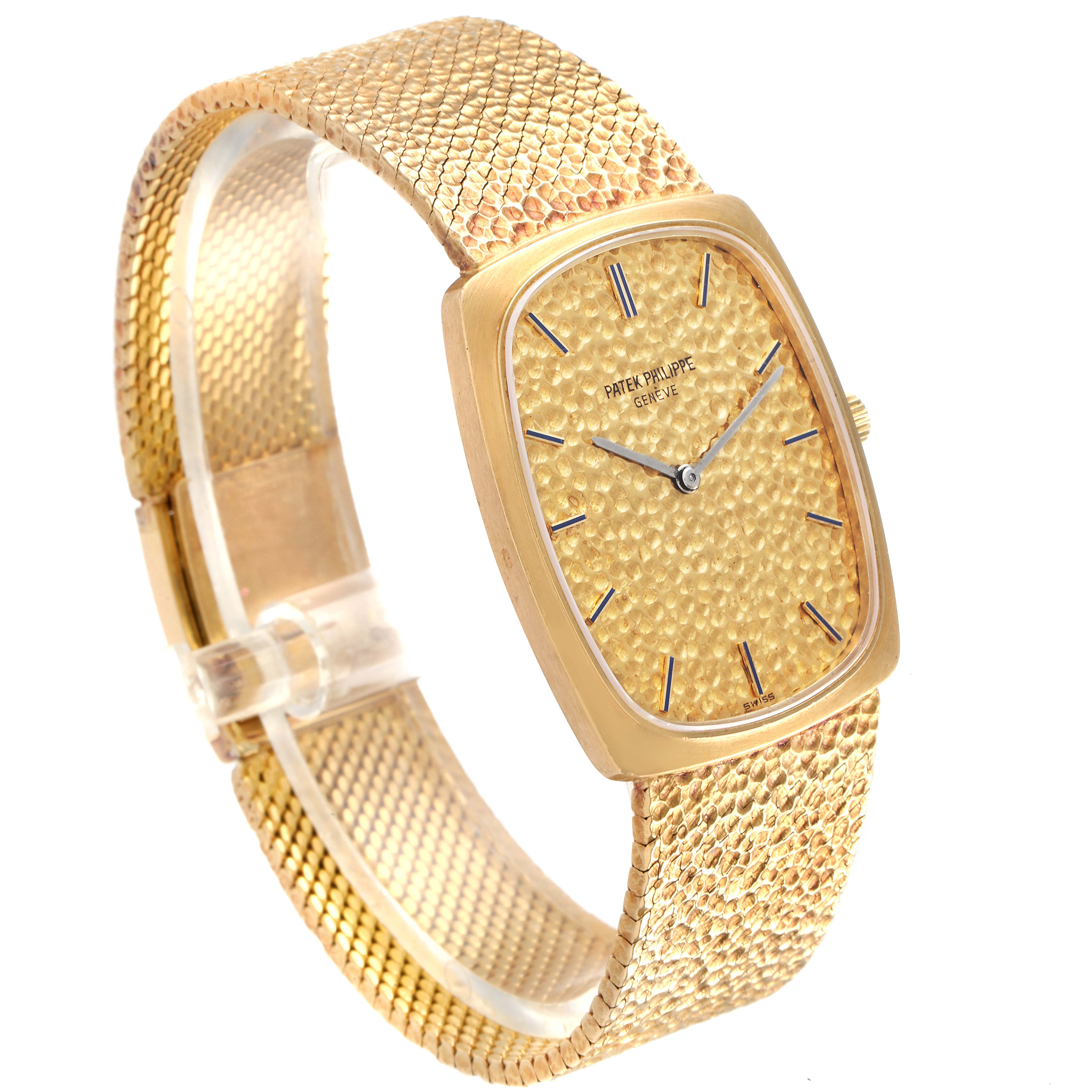 The image shows a side view of the Patek Philippe Vintage 3567/1 Men's Yellow Gold Champagne Dial 3567/1 Men's Yellow Gold Champagne Dial model watch, highlighting its textured gold dial and matching gold bracelet.