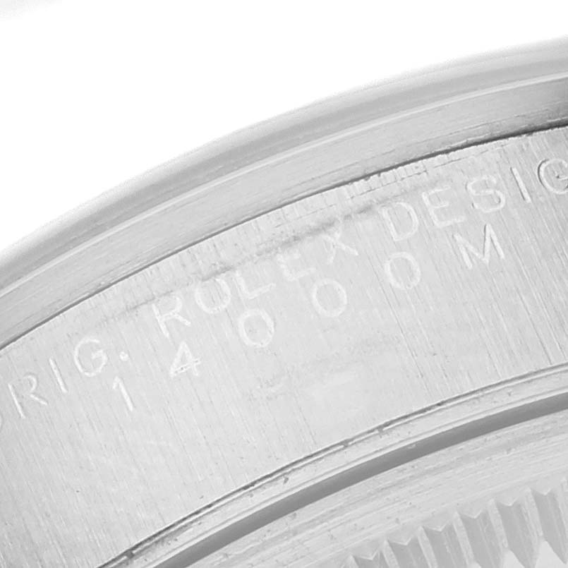 The image shows an angled close-up of the engraved case back of a Rolex Air-King 14000 Men's Stainless Steel Black Dial 14000 Men's Stainless Steel Black Dial watch.