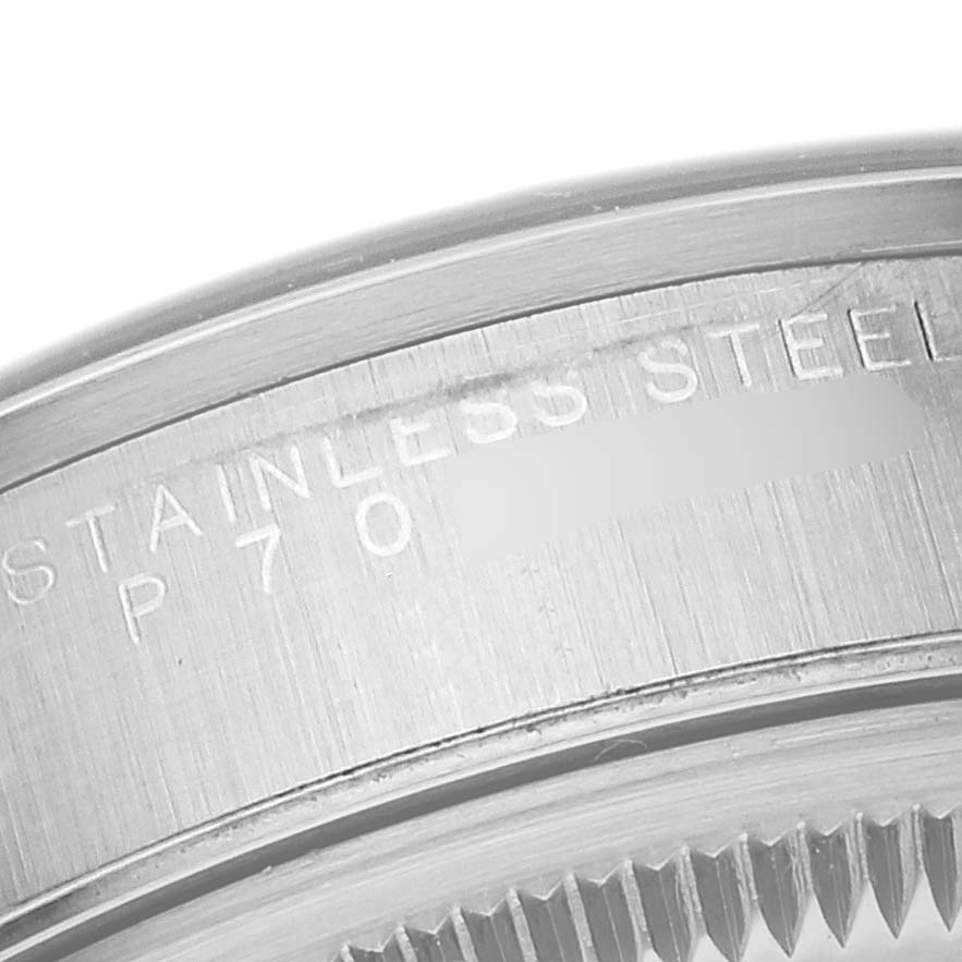 Close-up of the inner bezel of a Rolex Air-King 14000 Men's Stainless Steel Black Dial 14000 Men's Stainless Steel Black Dial watch, showing "STAINLESS STEEL" engraving.