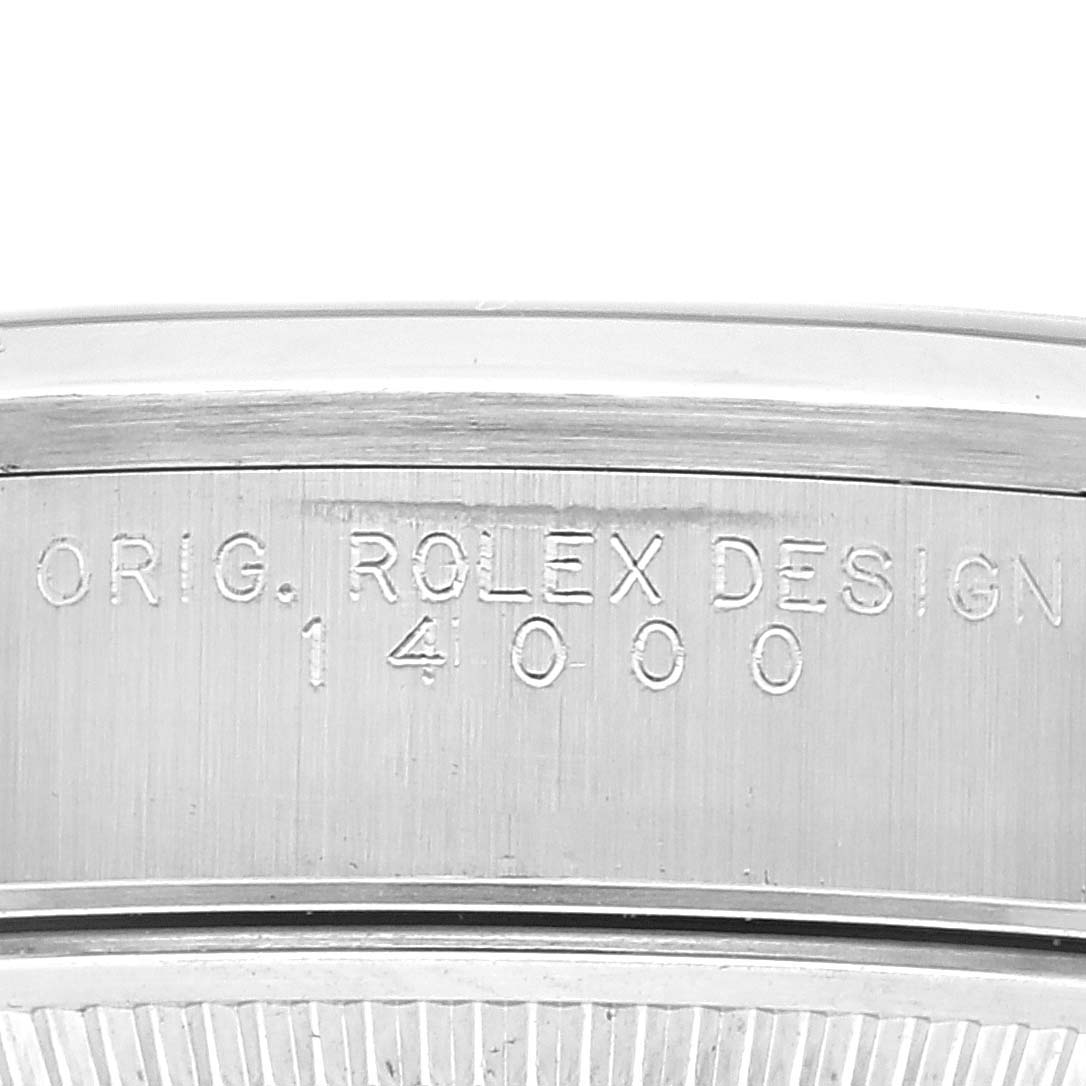 This is an engraved side view of the case back of a Rolex Air-King 14000 Men's Stainless Steel Pink Dial 14000 Men's Stainless Steel Pink Dial watch, showing the model number "14000".