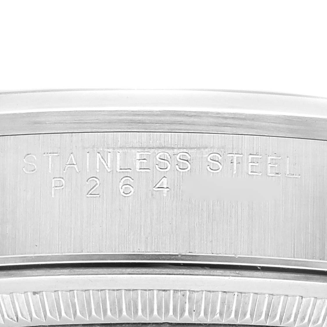 The image shows a close-up of the side engraving on the stainless steel case of a Rolex Air-King 14000 Men's Stainless Steel Pink Dial 14000 Men's Stainless Steel Pink Dial watch.