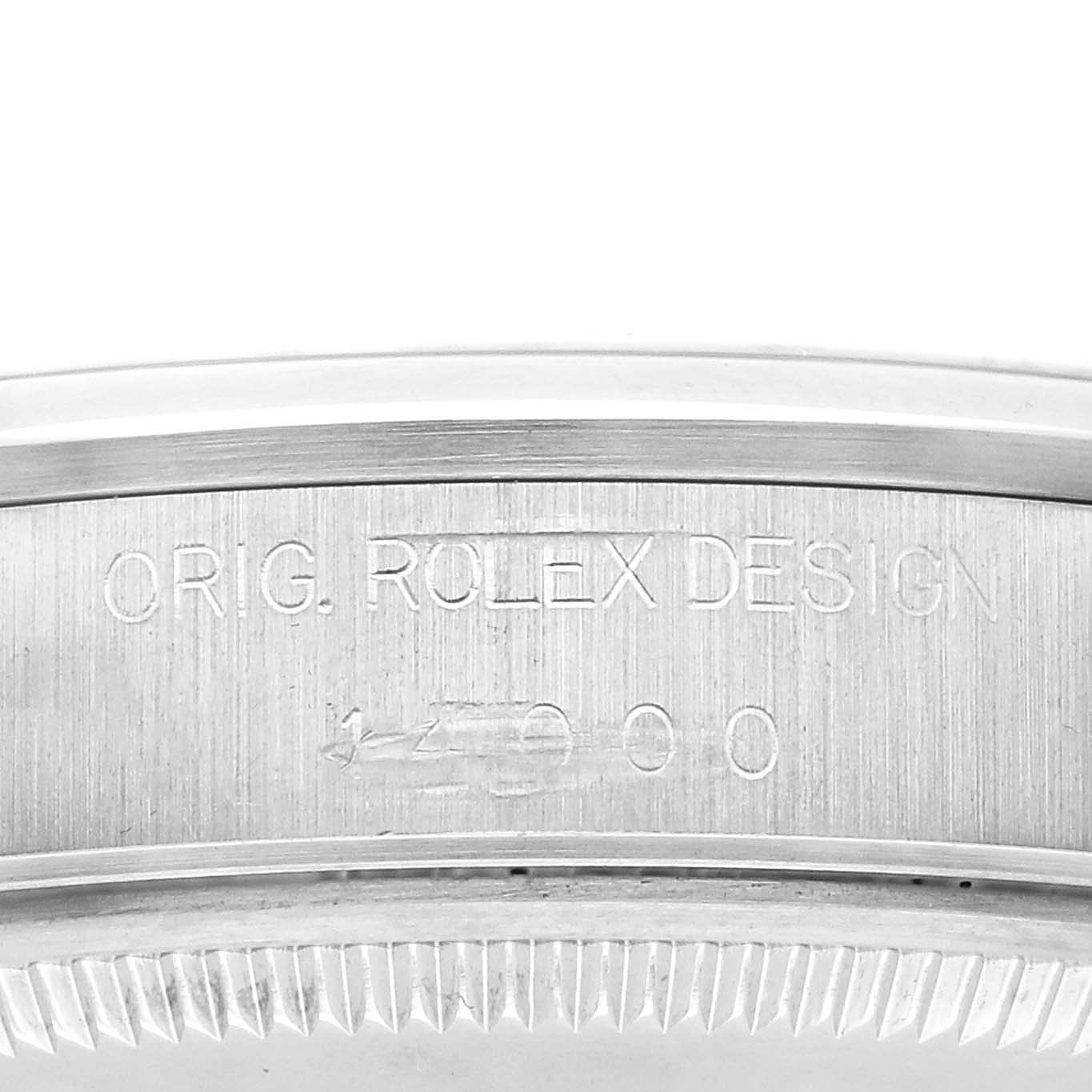 The image shows the side engraving of the bezel on a Rolex Air-King 14000 Men's Stainless Steel Black Dial 14000 Men's Stainless Steel Black Dial, displaying the "Orig. Rolex Design" inscription.