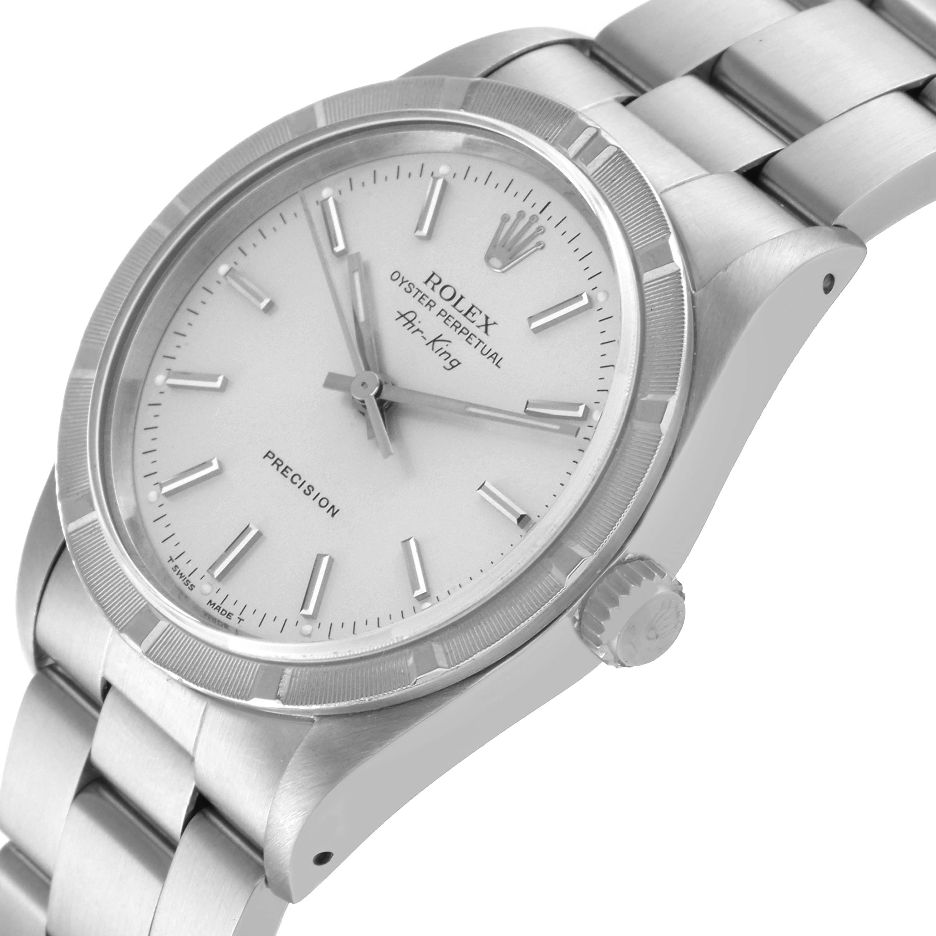 The image shows a side and angled view of the Rolex Air-King 14010 Men's Stainless Steel Silver Dial 14010 Men's Stainless Steel Silver Dial watch, highlighting the dial, bezel, crown, and bracelet.