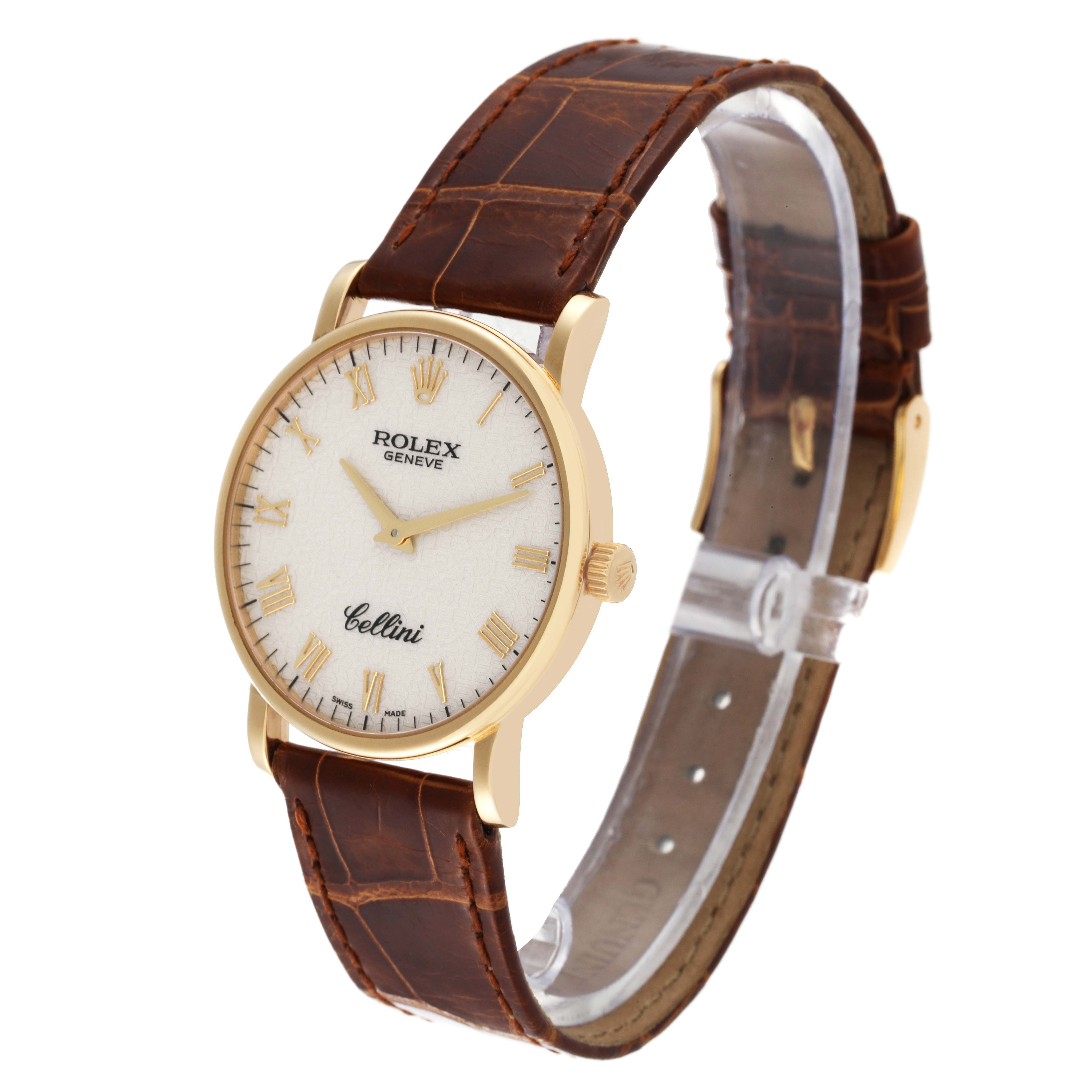 The Rolex Cellini 5115 Men's Yellow Gold Beige Dial 5115 Men's Yellow Gold Beige Dial watch is shown at a three-quarter angle, displaying its face, dial, and brown leather strap.