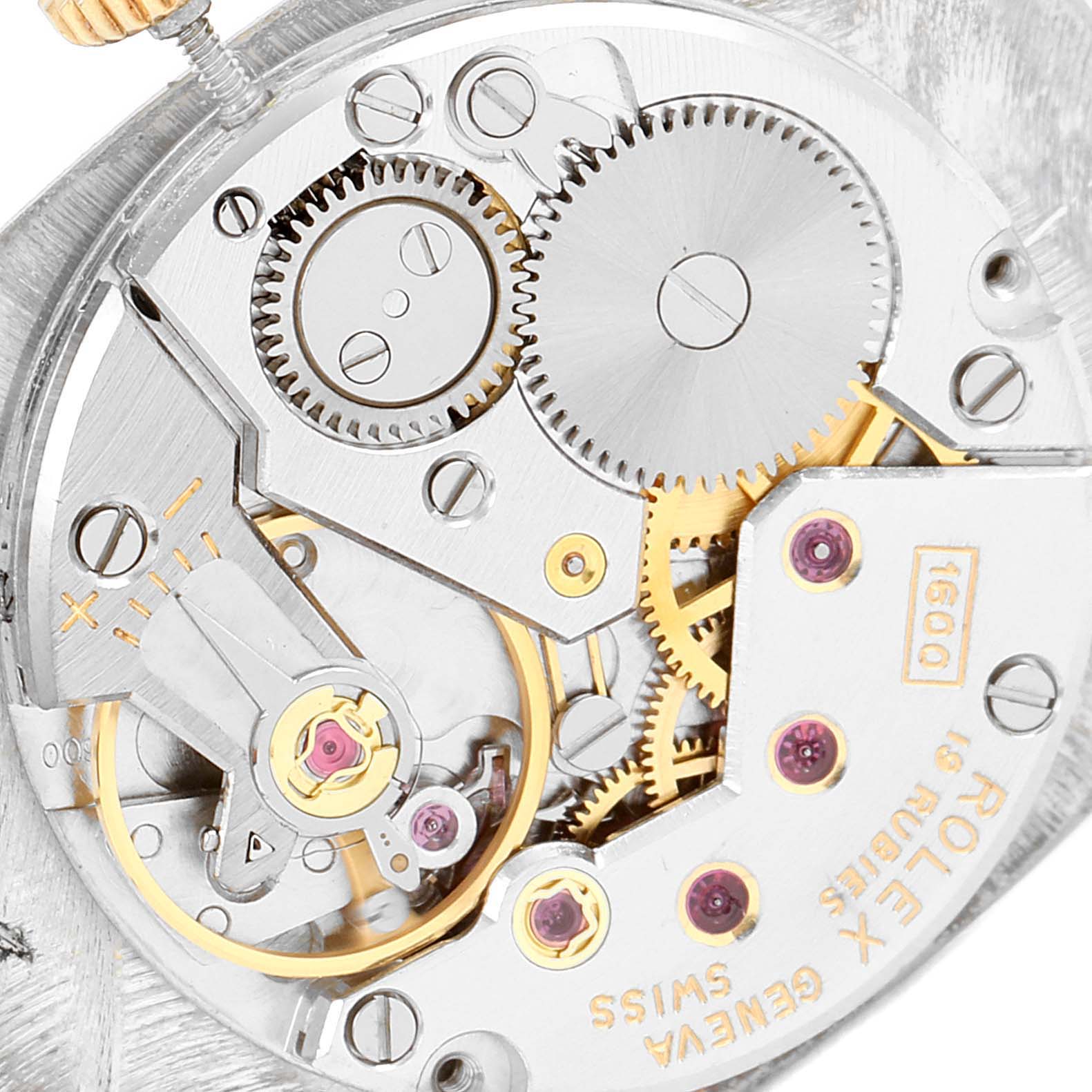 The image shows a close-up of the movement mechanism of a Rolex Cellini 3807 Women's Yellow Gold Champagne Dial 3807 Women's Yellow Gold Champagne Dial watch.